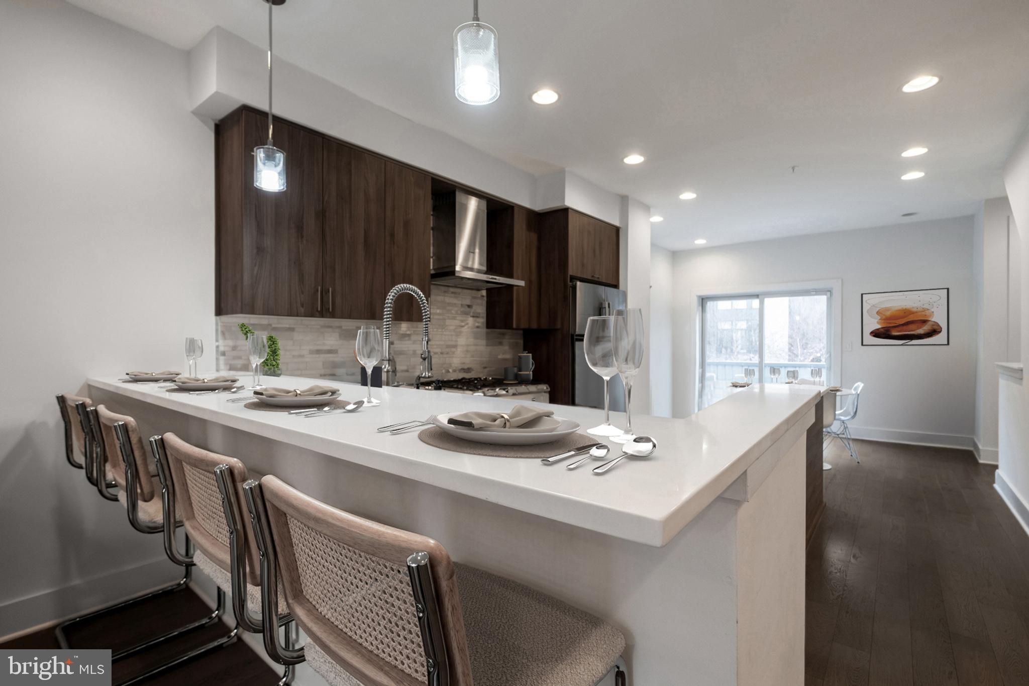 This newly constructed 3-bedroom townhome offers the perfect blend of MODERN LUXURY and urban convenience. Nestled in a peaceful courtyard setting, this home is designed to impress from the moment you arrive.
Step inside to a spacious entranceway with direct GARAGE access, providing a warm and convenient welcome. A wide staircase leads you to the heart of the home—an open-concept living, dining, and entertainment area that seamlessly flows to the first of THREE PRIVATE OUTDOOR SPACES.
The chef’s kitchen is a showstopper, featuring sleek white marble countertops, a breakfast bar, and a formal dining area, all overlooking a sun-drenched living room with SOUTHERN EXPOSURE.
The next level boasts two generously sized bedrooms with ample closet space and a stylish marble and tile bathroom.
Ascend to the primary suite, a private retreat offering serenity, comfort, and an elegant en-suite bath with double sinks and a glass-enclosed shower with a window and a PRIVATE BALCONY off the bedroom.
At the top, a sprawling ROOFTOP DECK extends your living space for six months of the year, perfect for entertaining or unwinding with stunning city views.
With HARDWOOD FLOORS throughout, garage parking, and approximately one year remaining on a real estate tax abatement, this contemporary townhome delivers both LUXURY and VALUE. All just minutes from Standard Tap, Café La Maude, Liberty Lands Park, Jefferson Pennsylvania, and Cooper Hospitals.
Don't miss this incredible opportunity to call Northern Liberties home!