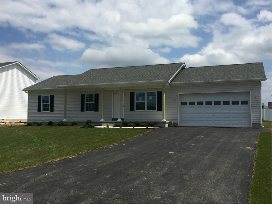 This home features hardwood flooring in kitchen/dining, living room and hallway.You can serve lots of company for dinner in the large kitchen and dining room. And after dinner you can enjoy watching the sun set from the front porch. This 3 bedroom 2 bath home is sure to please. Call today for a showing!