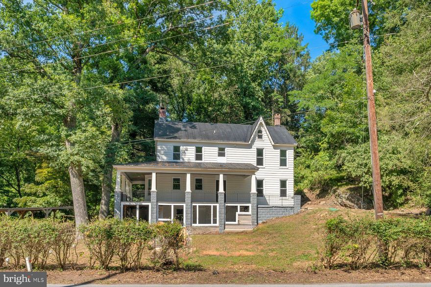 Renovated home with modern conveniences & historic charm!.  This large 4 bedroom/3 full bath colonial offers new HVAC, new double hung windows, an open floor plan with luxury vinyl plank flooring throughout the main floor and a brand new septic system.  The main floor features a 1st floor bed/office, laundry room and  kitchen with 8' island/white shaker cabinets/tiled backsplash/SS appliances & walk in pantry.  Off the kitchen is a spacious family room with gas fireplace and upstairs you will find large secondary bedrooms, a hall bath and owners bedroom with 2 closets and owners bath w/customed tiled shower.  Adding to the space is a fully finished attic with potential bed/office.  Outside you will enjoy shade from the mature trees and a full wrap around porch, plus right across the street you can enjoy the south branch of the Potomac River!