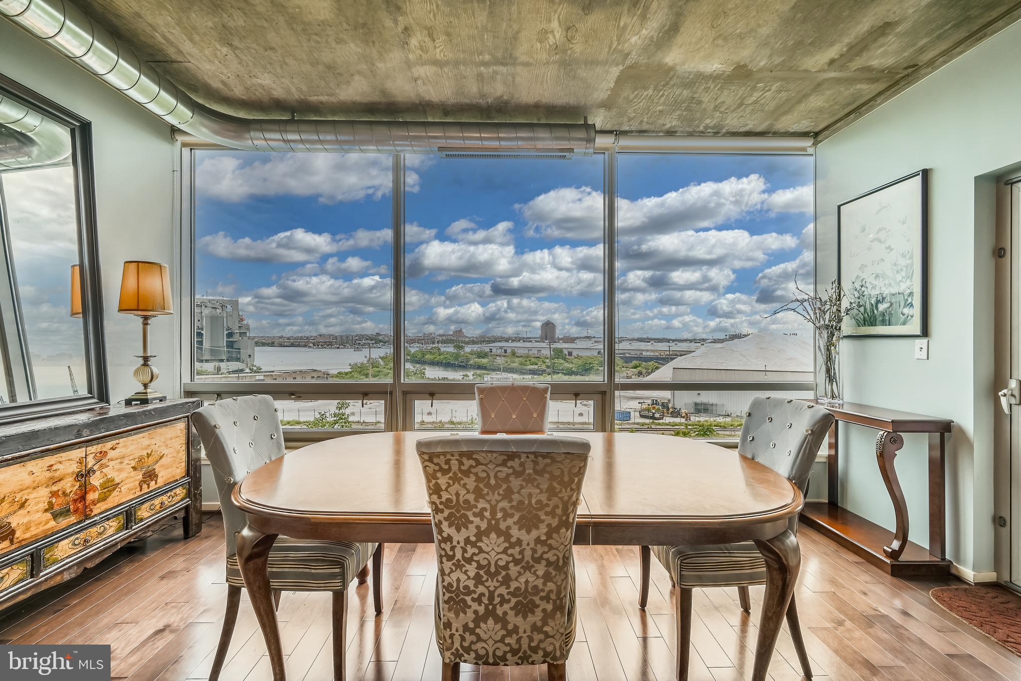 Welcome to refined living at 1200 Steuart Street, a premier high-rise residence in the heart of Baltimore. This expansive 1,859-square-foot home offers sophistication and comfort, featuring two generously sized bedrooms and 2.5 well-appointed bathrooms.
As you enter the home, you're immediately greeted by sweeping panoramic views that stretch across the harbor and skyline, visible through floor-to-ceiling windows that fill the space with natural light. The entryway opens into a seamless living and dining area, enhanced by recessed and track lighting that highlights the clean, modern design.
The gourmet kitchen is thoughtfully designed with high-end finishes, ideal for everyday cooking or entertaining guests. A spacious balcony with multiple exposures—including northeast, east, and south—invites both morning light and vibrant city views.
The primary suite offers a quiet retreat, complete with a custom walk-in closet and a spa-inspired ensuite bath featuring a double vanity, soaking tub, and separate shower. The second bedroom also offers generous storage and its own private bath, making it perfect for guests or accommodating flexible living needs.
Additional features include a dedicated laundry room with in-unit washer and dryer, as well as two ideally located garage parking spaces with options to rent or purchase additional spaces.
Residents enjoy access to a full suite of amenities, including a fitness center, yoga studio, game room, resident lounge, media room, and landscaped courtyard. A comprehensive security system and 24-hour concierge-level services add convenience and peace of mind.
Experience elevated city living in one of Baltimore’s most desirable condominium communities.
Luxury, convenience, and views—this condo delivers it all.