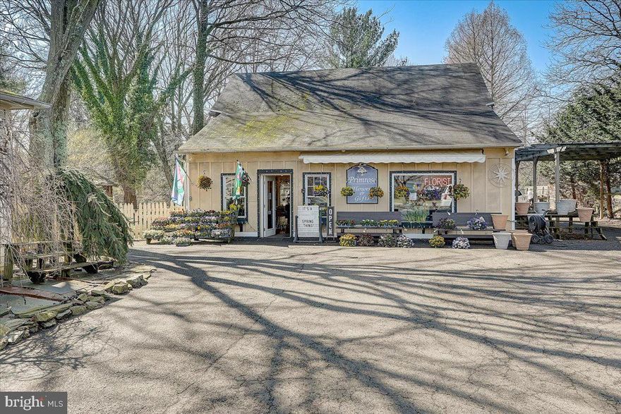 Rare opportunity!!!  After almost 20 years (in this location), this Upper Dublin local gem, is ready for it's next entrepreneur with vision.  This 2.23 acre, mixed use property contains a 5 bed/1.5 bath home, a converted barn/shop with successful floral/gift business, 5 garages and parking and is conveniently located in the heart of Upper Dublin.
**
The main home is just shy of 2000 sq ft with hardwood floors throughout.  This center hall colonial has a formal living room & dining room and an open flow between the family room and the kitchen.  The 2nd floor has 3 spacious bedrooms with a shared full bath.  The 3rd floor has 2 additional rooms.
**
The shop/barn has 1828 sq ft of retail and storage space with additional, uncalculated 2nd fl space including an office and tons of attic storage space.  There are two 2-car garages and one 1-car garage - totaling 5 garage spaces as well as a private parking lot.  
**
Aside from these living and retail spaces, there is land totaling 2.23 acres which can be subdivided.  Public water and sewer are on the street, but not currently hooked up.