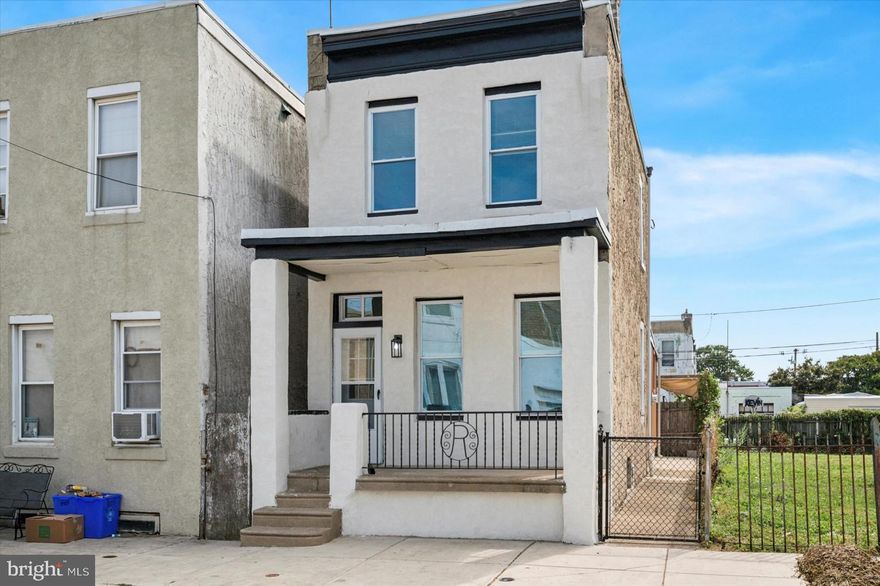 Welcome to this beautifully renovated 2-bedroom, 1-bathroom located in Port Richmond. Brand-new luxury vinyl plank flooring throughout the entire home, offering a modern, stylish look and easy maintenance. Enjoy cooking and entertaining in this brand-new kitchen featuring white cabinets, granite countertops, and stainless-steel appliances. Bathroom has been completely updated with new tile throughout, a modern vanity, new toilet, and fresh finishes. Entire house has been freshly painted in neutral tones, complemented by updated trim.  Exterior of the house has been finished with a modern stucco look, accented by bold black paint. New front, back, and storm doors ensure security and add to the home's curb appeal. 
Clean, unfinished basement comes equipped with a washer and dryer. Enjoy local eateries, trendy coffee shops, and neighborhood staples like Tacconelli's Pizza, Byrne's Tavern, Kensington Pub, and Her Daughters Cafe. Convenient access to I-95 makes commuting a breeze, whether you're headed into Center City or out of town. This location provides the perfect mix of quiet residential living with easy access to all that Philadelphia has to offer.