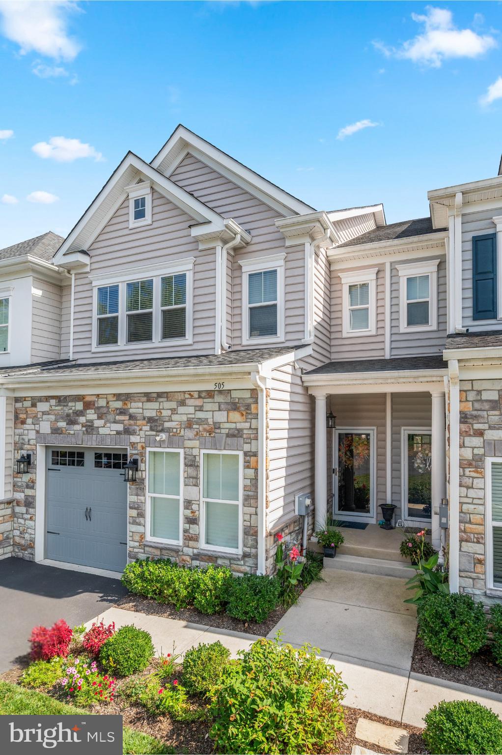 Welcome to 505 Trotters Court, in the Carriages at Runnymeade Farms, where homes rarely come onto the market. Built in 2019 and offering four floors of tremendous finished living space with the perfect blend of style, comfort, and convenience. This stunning residence shows like a model home, featuring 4 spacious bedrooms and 4.5 baths. Designed with today’s lifestyle in mind, the open and airy floor plan is accented with neutral tones, modern finishes, and timeless décor. The inviting first floor includes 10 ft ceilings, hardwood flooring and stylish custom millwork in the front Foyer-creating an impressive entrance. A formal Dining Room is on the left as you head towards the back of the home which showcases the open layout Great Room boasting the gourmet Kitchen, Breakfast Area and Living Room. Crisp white cabinetry, a generously sized island, stainless steel high end appliances including a double oven, gas cooking and a wine refrigerator are some of the highlights of this beautifully designed Kitchen. An adjacent breakfast area provides additional space for dining or entertaining with a slider leading to the spacious composite deck. A lovely spot for outdoor dining or relaxing with it's pretty view of the lush landscape which changes with each season. Enjoy the fireside Living Room which is open from the Kitchen and is great connected space to watch TV or unwind while still being part of the action in the Kitchen. The Powder Room and access to the Garage complete this first floor. Upstairs, the hardwood flooring continues. The gracious Primary Suite includes a lovely Bedroom with a spacious custom outfitted walk in closet and a gorgeous Bath with a double vanity, herringbone designed flooring, an oversized tiled shower with dual showerheads, and private water closet. An additional two more bright Bedrooms share the hall full Bathroom with double vanity and a combination tub/shower. The conveniently located Laundry is also on this floor. Terrific flexible space is offered on the light filled 3rd Floor! Complete with a full Bathroom and step in shower, this finished floor is ideal as a 4th Bedroom/Junior Suite, private home Office or Gym. The living and recreation space continues into the fabulous walk-out Lower Level which is an entertainer’s dream with a sleek custom bar and a full Bath, creating the perfect spot for gatherings, game days, or movie nights. Nestled within the highly desirable Runnymeade Community, residents enjoy wonderful amenities including a pool, tennis courts, pickleball courts, a walking trail and planned community events throughout the year. Outdoor enthusiasts will love the quick access to Ridley Creek State Park’s scenic trails, while the vibrant towns of Newtown Square and Media are just a stone’s throw away, offering an array of shopping, dining, and cultural experiences. Additionally, the convenient proximity to the Blue Route, Rt 1, West Chester Pike and the Philadelphia Int'l Airport makes commuting a breeze. This outstanding move-in ready home combines sophisticated living with an unbeatable location. Don’t miss the opportunity to make 505 Trotters Court your new address!