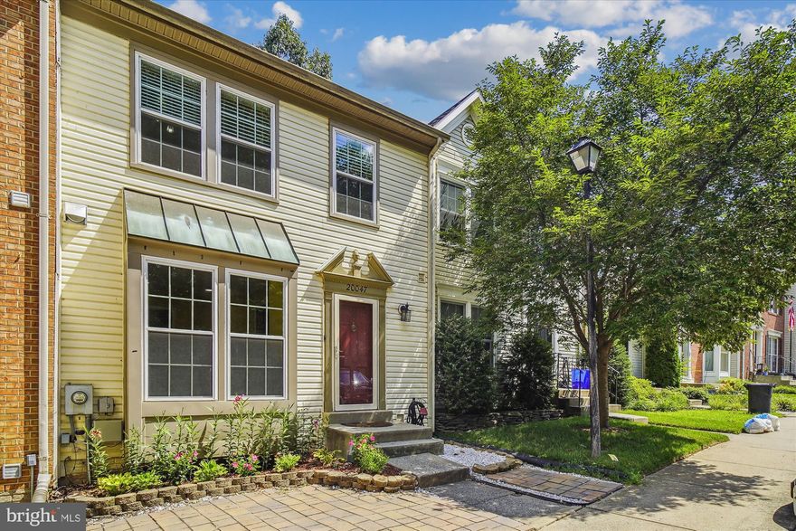 MOVE-IN READY!!  This stunning townhome is not to be missed!  Set in a prime location within Churchill Town Sector/Waters Landing Community, this townhome is nestled in a park-like setting away from the hustle and bustle!  This move-in ready home boasts an open concept on the main level with abundant natural light, custom moldings and other recent updates!   Wood floors and new carpet are on the main level, a sunny kitchen features stainless appliances, gas cooking, custom backsplash and a convenient pass-thru to the dining area.   The spacious and airy dining/living area boasts new custom and recessed lighting, new carpet and a French-door exit to the deck that offers peaceful summer views of nature and trees, and in winter Black Hills Regional Park and Little Seneca Creek...how awesome is this for privacy and pleasure!  The upper level features the primary bedroom with vaulted ceiling, two closets with built-ins and private bath with tub and separate shower, two airy and bright secondary bedrooms with vaulted ceiling, and updated hall bath round out this level!  The fully finished lower level offers new carpet, a spacious family room with gas fireplace and mantel, custom lighting and new SGD exit to the patio.  In addition this level offers a home office/playroom with custom shelving, third full bath, a good-size laundry/storage room and there is additional under-stair storage.  The Churchill community offers abundant amenities (pool, tennis, play areas, trails, paths, parks, lake access) and is located near to bountiful shopping, dining, entertainment options!  Nearby is Black Hills State Park, MARC train station public transportation and other major commuter routes!  Hurry to see!!