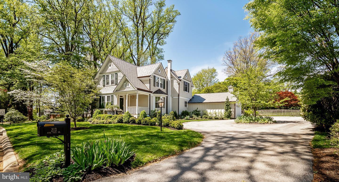 Welcome to 213 Pine Tree Road, Wayne, PA – A Rare Gem
This meticulously updated Victorian Carriage House, originally part of the historic Berwind Estate, seamlessly blends early 20th-century charm with modern luxury for today's lifestyle. This residence is sited on a spacious, beautifully landscaped, one-acre lot, perfectly located in the coveted Northwoods neighborhood of Radnor Township. The property offers 4 bedrooms, 2 full and 2 half bathrooms, a new roof, copper gutters, all new siding and approximately 3,070 square feet of living space.
Step inside to an inviting floor plan featuring hardwood floors, abundant natural light, and thoughtful updates throughout. A gracious Center Hall is open to a grand step-down Living Room which is light-filled and features a vaulted ceiling, expansive windows, sliding glass doors, custom built-ins, powder room, and a cozy gas fireplace. The formal dining room with lovely crown molding and mill work is accessible from the hallway and the kitchen. The gourmet custom Plato kitchen showcases every luxury a chef could want including a Sub-zero fridge, 4-burner professional Thermador range, a custom-built Grothouse walnut island top and natural stone countertops. The kitchen flows into a completely open concept Family room, with a awesome gas fireplace, Flat Screen TV, walls of windows and sliding doors, the 2nd Powder room and first floor Laundry. An adjacent auxiliary room, currently utilized as an office, can easily be a Breakfast room or a kid’s playroom. The Primary bedroom suite is filled with natural light on three sides. It has a vaulted ceiling, generous custom closet space and a lovely en-suite bath with natural stone. Three additional good-sized bedrooms and a full hall bath complete the second floor.
The flagstone patio is accessed through French doors from the family room and included a pergola with newly added electric and a professionally redesigned French Drain with boxwood surround . . . an entertainer's dream or just a quiet place to relax. The private flat rear yard is enhanced by beautiful professionally designed gardens, gracious trees, a second brick patio with firepit, a charming playhouse or storage shed and an expansive completely fenced lawn. A circular driveway offers plenty of parking in addition to the two-car detached garage.
This is a very special house and property. It is located close to Wayne, has award winning Radnor Schools, is in close proximity to parks, walking trails, restaurants, shopping, major highways and all the amenities the Main Line has to offer.