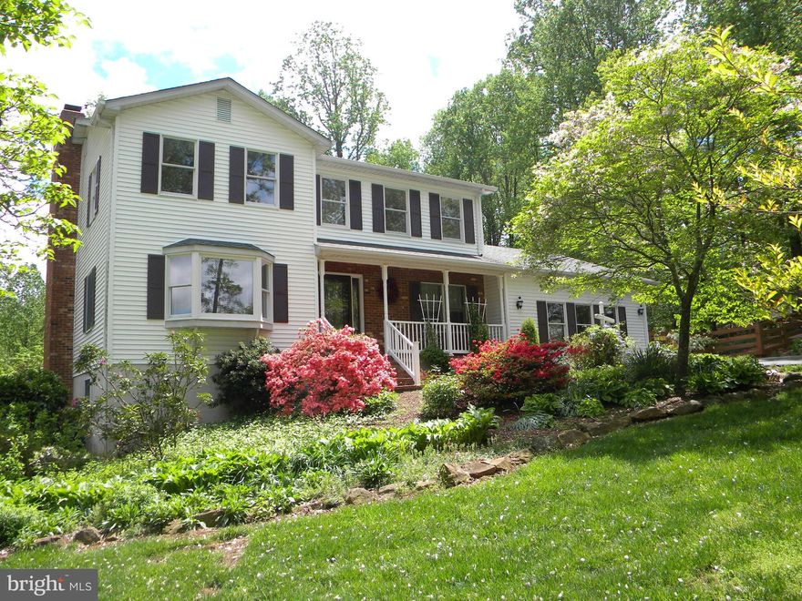 Paved drivewy, extra parking & 3 car det.gar w/ lift, fully fenced, smaller area w/ a doggie door into 1 of 2 sheds, inground pool, large deck w/ auto awning & lower deck & patio underneath leading in bsemnt, woodstv connects to duct work - large great rm w/ wood floors, large kitch w/ pantry, laundry main lvl, 3 bed-4bath, fam rm, liv rm, 2-3 extra rooms in bsmnt for your hobby/teenager or rec rm