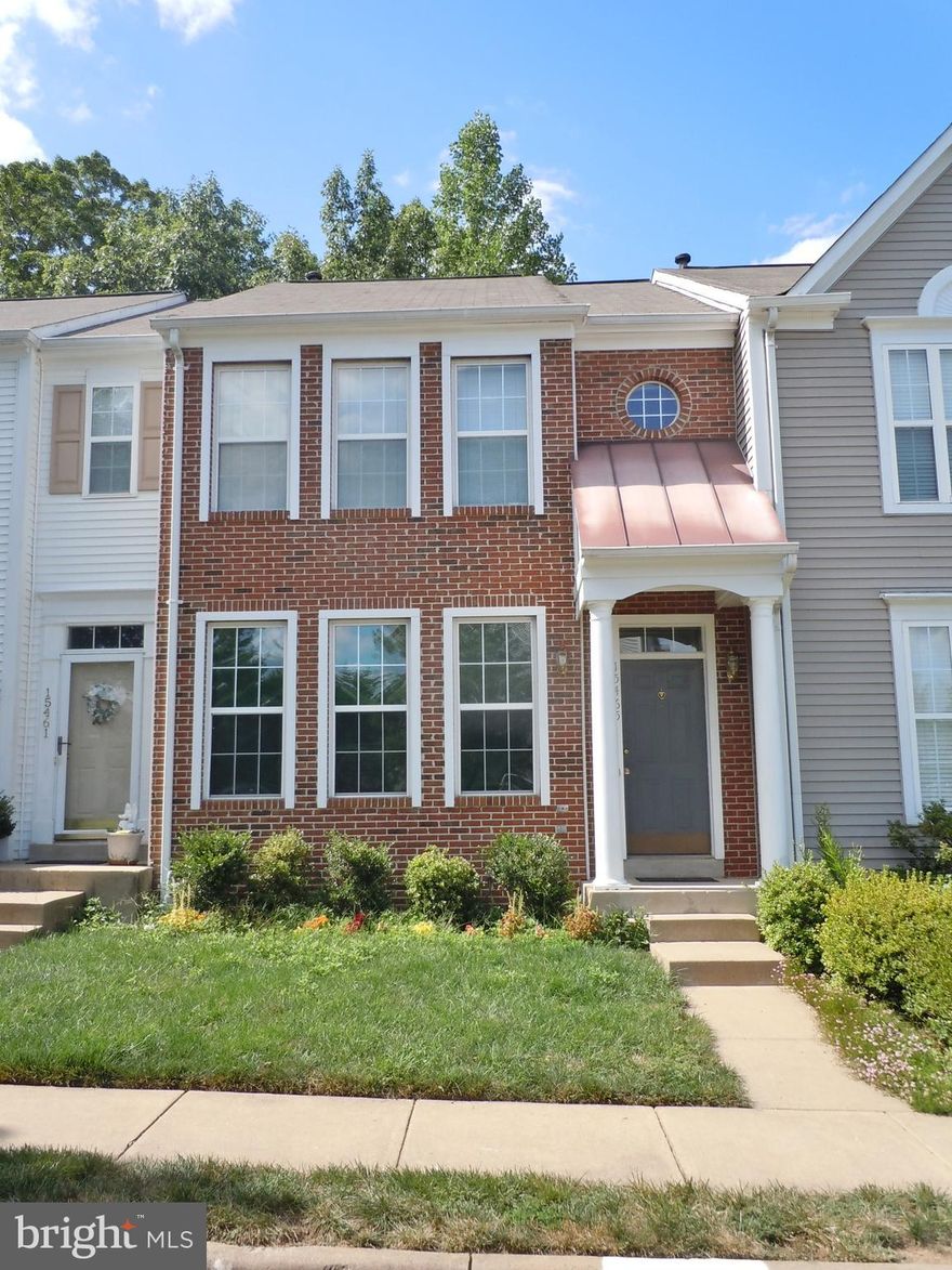 Beautiful, spacious townhouse in sought after Southlake at Montclair!  Hardwood flooring throughout the main level.  The eat-in kitchen has granite counter tops and table space that walks out to a large deck for entertaining.  Newer laminate wood flooring on entire upper level! Master bedroom with vaulted ceiling and attached bathroom that has a soaking tub, separate shower and double sinks!  There are two other good sized bedrooms and another full bath on the upper level.  The finished basement offers a spacious rec. room with a fireplace and walkout to the back yard.  There is also a bonus room that could be used as a fourth bedroom;  it has a closet and an attached full bath!  This home backs to woods for loads of privacy.  Enjoy all the amenities of Montclair with loads of commuter options available as well.