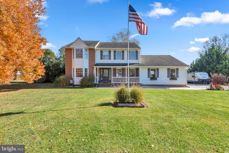Welcome to 124 Overlook Drive nestled in the Overlook at Carmichael Community on a quiet non-thru street.  This well-maintained Colonial-style spanning over 2,454 square feet is designed to cater to both relaxation and entertainment.  Featuring an open floor plan with 3 Spacious Bedrooms and 2 and a Half Bathrooms.  Step Inside to a Formal Living Room and Dining Room with newer luxury vinyl tile flooring spanning the entire first floor.  The kitchen boasts ample cabinet space with counter seating and table space.  The adjoining family room, complete with a cozy gas brick fireplace and mantel, invites you to unwind after a long day and don't forget the cozy updated Sunroom off the kitchen for extra living space with a Pellet Stove, new windows and new French doors leading to the rear yard.   Head upstairs to the Primary Bedroom offering a spacious walk-in closet and an ensuite bath.   2 Additional Bedrooms are generously sized and a Full Hall Bathroom completing the second level.  Enjoy the outdoors on the charming concrete patio with a picturesque view of the adjacent farmland, perfect for morning coffee or evening gatherings under the stars.  When needed there is a 20’ Sun Setter Auto Awning.  The exterior of the property is equally impressive, set on a sprawling 1.23-acre lot that adjoins open space, offering a sense of tranquility, privacy and invisible fence with landscaped grounds.  Parking is a breeze with an oversized side-entry (newer insulated garage doors) that accommodates 2 Vehicles, work shop/extra storage along with an expansive driveway providing ample space for your Camper, Boat and Guests.   Easy access to RT50 and RT301 and only 15 minutes to the Bay Bridge which is ideal for commuting.  Close to area Waterfront Restaurants, Golf & More.  Short drive to historic Annapolis and St. Michael’s.  Only 90 minutes to the Atlantic Ocean.  Schedule your private showing today and experience everything this outstanding home has to offer.  This property is not just a house; it's a lifestyle waiting to be embraced.  Quick settlement available.  1 Year Home Warranty included.