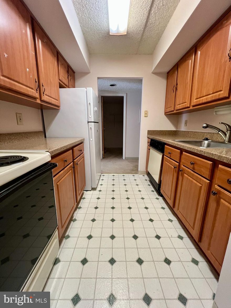 This 2-Bed/2-Bath Condo is located in the luxurious Crum Creek Valley Condominiums in Wallingford! Perfectly situated off a private driveway, you will love the peace and quiet this community offers. The community is surrounded by mature trees which are beautiful to look at from your private balcony. The community also includes features like a tennis court and swimming pool!

Enter the condo and immediately fall in love with the spacious living room. The space includes carpet flooring and receives tons of natural light from the sliding glass doors. The dining area can accommodate an eight-seat dining set with ease and gives you plenty of options when furnishing the space!

The kitchen is luxurious and includes tile flooring, oak cabinetry with dark hardware, and faux-granite countertops. The kitchen also comes fully equipped with a refrigerator, four-burner electric range, dishwasher and built-in microwave! There is plenty of storage throughout the oversized cabinets and enough counterspace to prepare any meal you can imagine.

The condo includes two spacious bedrooms complete with carpet flooring and large windows which allow even more natural light to pour in. The primary bedroom is spectacular and includes a walk-in closet and en-suite bathroom!

The second bathroom is located in the hallway and is easy accessible for guests. It includes tile flooring, a large vanity with plenty of storage, and a shower stall with sliding glass doors!

Tenants are responsible for all utilities in addition to rent each month. Tenants are also responsible for any move-in and/or elevator reservation fees due to Crum Creek Valley Condominiums. Sorry, no pets permitted.

Application Qualifications: Minimum monthly income is 3 times the tenant’s portion of the monthly rent, acceptable rental history, acceptable credit history and acceptable criminal history. More specific information provided with the application.