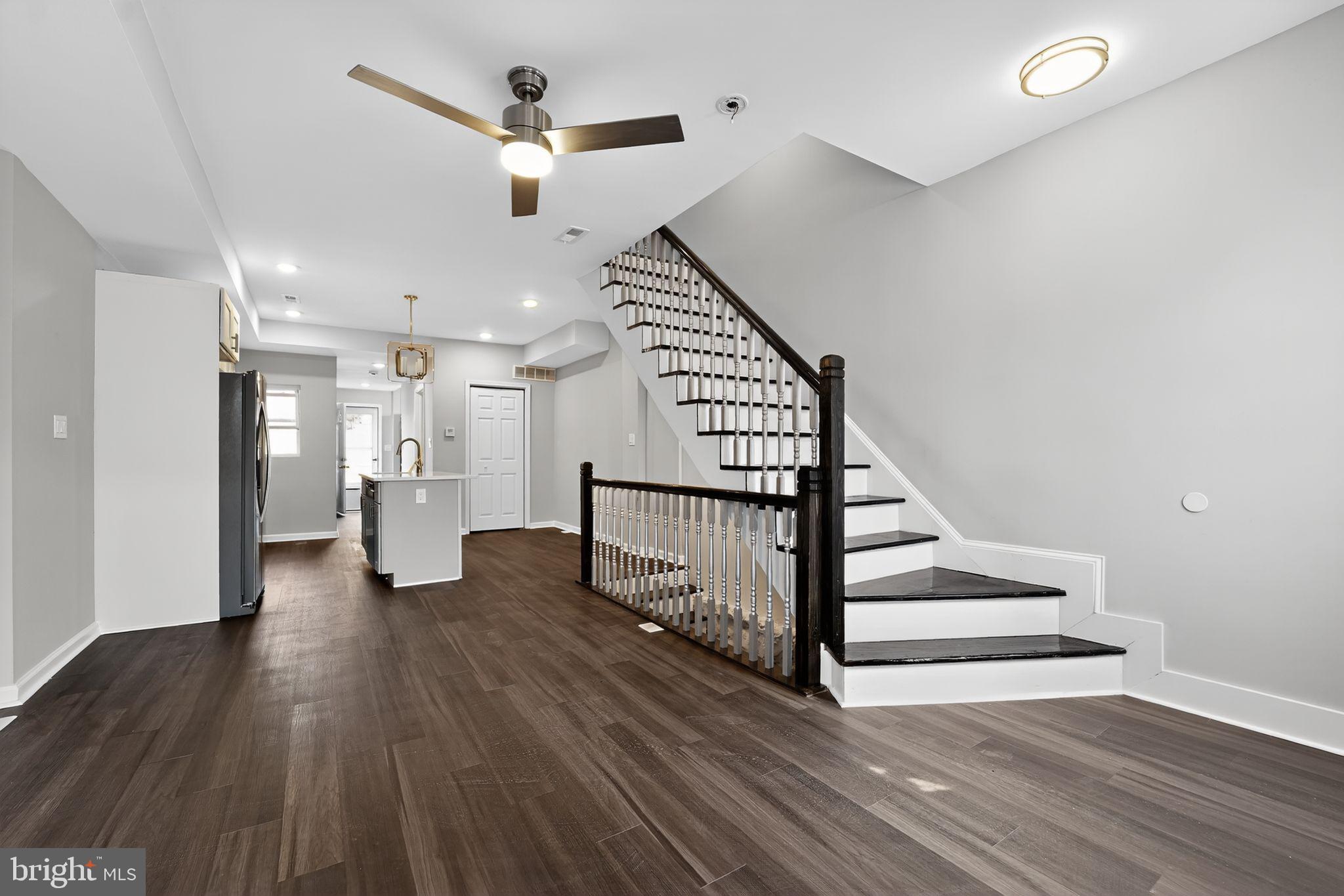 Welcome to 3106 Brighton Street! This fully renovated home in the heart of the up and coming West Baltimore neighborhood is a MUST SEE! The house has brand new stainless steel appliances, new floors, private off street parking, fully finished basement,3 bedrooms, 4 full bathrooms, 2 primary suites with En suites, new kitchen with center island, and a Sunroom that can double as an office. Plenty of natural sunlight which will save on energy bill. Freshly paved front and back yards, perfect for entertaining. Schedule your showing today!