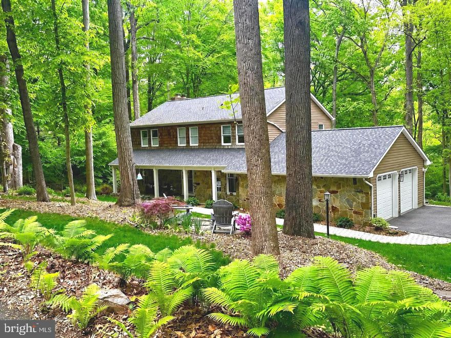 OPEN HOUSE SUNDAY 1-3PM. Nestled on a tranquil private road in the highly sought-after The Downs on the Severn, this stunning stone-front Colonial offers the perfect blend of luxury, privacy, and modern convenience. Situated on 1.43 acres surrounded by nature, this beautifully remodeled 4-bedroom, 2.5-bath home has been thoughtfully updated from top to bottom with exceptional attention to detail.

Step inside to discover gorgeous new hardwood floors throughout and an open-concept layout designed for effortless entertaining and everyday living. The fully updated gourmet kitchen features warm, high-end cabinetry, elegant quartz countertops, and premium stainless steel appliances. Extensive upgrades include gas installation for the range and fireplace connections, a newer water heater,  newer HVAC system, dual-tank water softener, sprinkler system, UV water filtration system, replacement first-floor doors, and updated roof and gutter systems.

The luxurious primary suite has been completely transformed with a modern spa-inspired bathroom and expanded his-and-her closet space, creating the perfect private retreat.

Outdoor living is equally impressive with beautifully designed patios and fire pit areas ideal for entertaining or relaxing on peaceful summer evenings surrounded by nature.

Residents of The Downs on the Severn enjoy an unmatched lifestyle with exceptional community amenities, including two marinas with slip availability, an outdoor pool with summer swim team, clubhouse, tot lot, little library, and scenic walkable streets throughout this private waterfront neighborhood. Conveniently located near BWI Airport, Baltimore, Washington D.C., and Maryland’s Eastern Shore beaches, with easy access to Routes 97 and 50.

This exceptional home offers the perfect combination of privacy, luxury, location, and community amenities — a rare opportunity that will not last long.