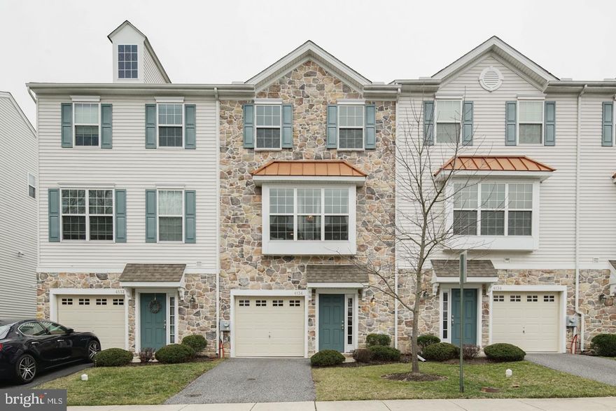 This immaculate brick front townhome in Concord Valley is ready for you!!! From the curb through the entire interior, this home is perfect! At 2,060 sq/ft (the largest model in the community) it has it all!  3 bedroom, 2.5 baths, 2 outdoor spaces, 1-car garage, laundry center, family room, oversized kitchen, gas fireplace, and tons of closet space. Enter the front through the lovely foyer which also has an interior garage entrance, a coat closet, a charming powder room, and hardwood floors. Walk through the foyer to your first-floor family room/den which can be used as a flex space for an office, workout room, or an additional living room. This area is well lit with natural sunlight pouring in through sliding doors that lead to an outdoor patio. This floor is completed with a washer/dryer and storage area. The main level is well lit and great for entertaining. You are greeted by a large living room with oversized bay windows with window seats, and a built-in gas fireplace to enjoy during those cold winter nights. A large eat-in kitchen accented by a center island, 42" maple shaker-style cabinetry with crown molding, GE stainless steel appliance package including dishwasher, built-in microwave, electric range, and French-door refrigerator. The kitchen also offers a pantry, eat-in area, and a bonus extended area waiting for your design ideas. Sliders off the kitchen lead to a 10 x 16 Trex deck, perfect for relaxing with your morning coffee or for al fresco dining. The main level has a beautiful primary bedroom with cathedral ceilings, a large walk-in closet, and a primary bath. Stroll through the hallway to find a linen closet, full hall bath, and 2 bedrooms with nicely sized closets. This is a prime location close to all major highways and 0.2 miles from public transportation There is nothing left to be done but move in kick back and relax! Come see and you won't be disappointed!