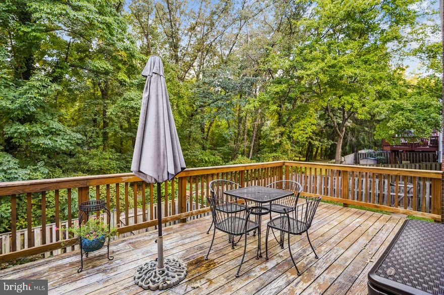 Fantastic opportunity to own in Lake Braddock Community. Make this townhome yours. Open the front door and be greeted by stunning luxury vinyl plank flooring that runs through the entire home (installed 2019). There is no carpet in this home, and freshly painted neutral tones welcome you throughout. 

Step into the main level which features a formal dining and living area, as well as a lovely galley kitchen with stainless steel appliances. Walk out onto the expansive deck with serene wooded views. Perfect for entertaining or just relaxing outside with a cup of coffee or tea. 

On the upper level, you will find a huge primary bedroom with two large closets and a well-sized second bedroom.  

And don’t forget about the nice-sized finished lower level. Plenty of room for an office, exercise equipment, or a place for the kids to play. Walkout level takes you to a patio and newer privacy fence. New HVAC (2020). Two assigned parking spaces. And you can’t beat the location with easy commute to I-495, walking distance to bus stop, shopping, restaurants, Lake Braddock Secondary School pyramid, and of course Lake Braddock Community amenities that include (2) pools, tennis courts, tot lots, boat landing, walking and bike trails and access rights to the lake.