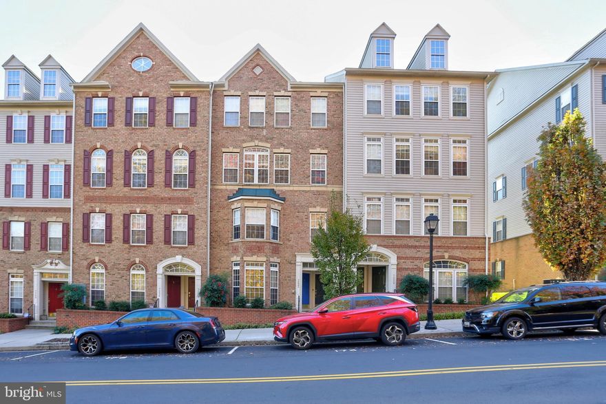 **MULTIPLE OFFERS RECEIVED** OFFER DEADLINE MONDAY 2PM (NOVEMBER 20TH).
Welcome to this stunning home that offers the perfect blend of space, style, and modern living. As you enter, you'll immediately notice the 5-inch engineered hardwood floors, installed in 2015, that flow throughout the main level, creating a warm and inviting atmosphere. The bay window in the front floods the formal living room with natural light, making it the perfect spot to relax and unwind. The upgraded kitchen is a chef's dream, boasting 42-inch cabinets that offer plenty of storage space, a large 2-tier island with a breakfast bar, and beautiful quartz countertops (November 2023). The kitchen has been thoughtfully designed and includes updated appliances, including a microwave (2023), refrigerator (2023), and oven (2022).  Upstairs, you'll find the primary bedroom, a true retreat with two walk-in closets, a tray ceiling, and a private bathroom. Updated blinds in the bedrooms replaced 2023, The second bedroom and third bedroom with closet and plenty of space are adjacent the second full bathroom.  Parking is a breeze with a garage and parking pad out back of the unit, providing guaranteed parking spots. Additionally, there is ample first-come, first-serve parking out front on Elkridge Crossing Way, ensuring your guests always have a place to park. Minutes from all major highways, grocery stores, shops and Guinness brewery. The perfect spot to call home is waiting! Make it yours today!