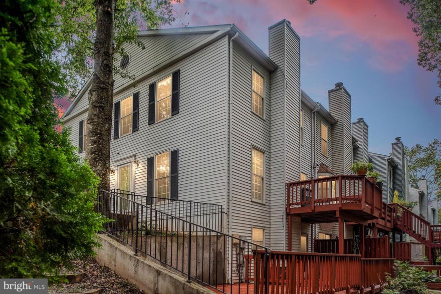 Beautiful end unit townhouse features 2 full and 2 half bathrooms; includes bonus room that could be 4th bedroom (NTC) or Den/Office in the basement. Lots of natural light and spacious rooms. Freshly painted throughout including trim and doors. New kitchen appliances Aug 2020. New lighting fixtures. New bathroom flooring and toilets; Upgraded Anderson  wood trim sliding patio doors upper and lower.  Roof replaced in 2017. Extra large lower deck great for entertaining has been freshly stained. Main level hardwood floors at entry and hallway. Kitchen has been updated with new appliances and includes space for eat in and access to the upper private deck overlooking a wooded common area. Upstairs the large Master bedroom includes a walk-in closet and en suite bathroom. Two bedrooms on upper level share hallway bathroom; Large recreation room in the basement with wood burning fireplace, new lighting and access to beautiful deck from the upgraded patio doors. Utility room includes laundry area with newer energy saver washer and dryer, 2nd refrigerator that conveys and space for storage or workshop; additional under stair storage. Bonus room (den/4th bedroom) and half bath complete the lower level.  Two assigned parking spaces. Wooded views from upper and lower decks.  Close to VRE, Public Transportation, & Potomac Mills Shopping Mall. Welcome Home! Please follow All CDC Guidelines. Shoe Covers Provided. Please use hand sanitizer.