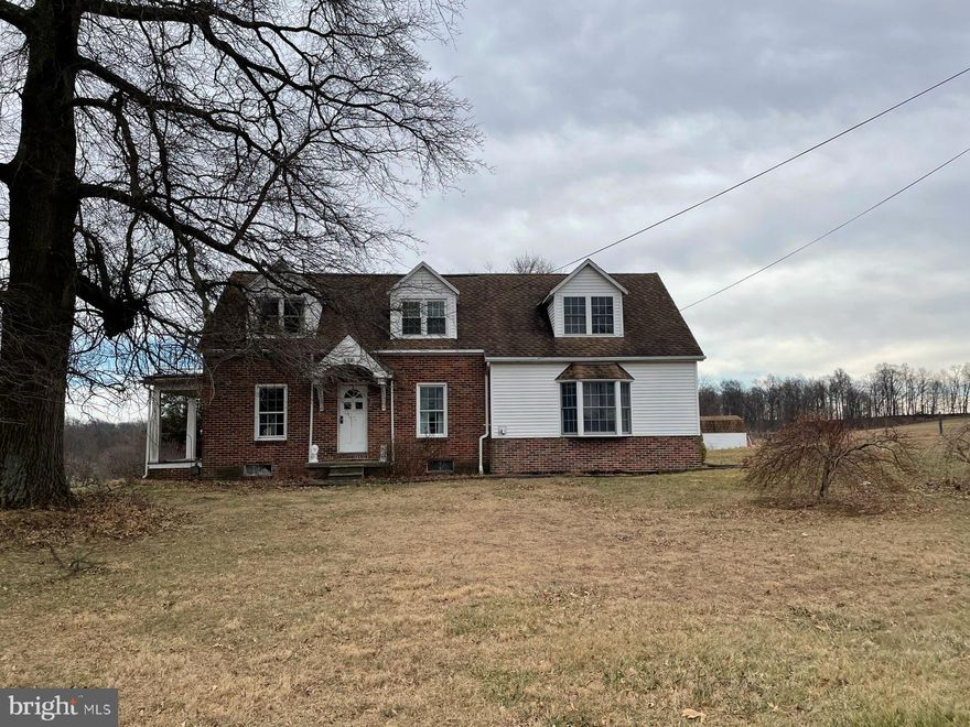 This Sweet Cape Cod in Red Lion Schools is sitting on 1.94 acres.  Home has 4/possible 5 Bedrooms.  1st Floor has an Eat-in Kitchen, 1/2 Bath, Laundry, a Separate Dining Room that could be a Bedroom or a Den, Side Porch, Large Living Room with  Pellet Stove, Primary Bedroom with Full Bath.  The  2nd Floor boasts  2 Bedrooms, Full Bath,  a walkthrough Sitting Room, Office or Gym.   Attic or a large Walk-in-Closet.  There is Basement Storage, Workshop and partially finished Rec Room, and 4th Bedroom.  Rec Room has its' own entrance.  Circular Driveway.