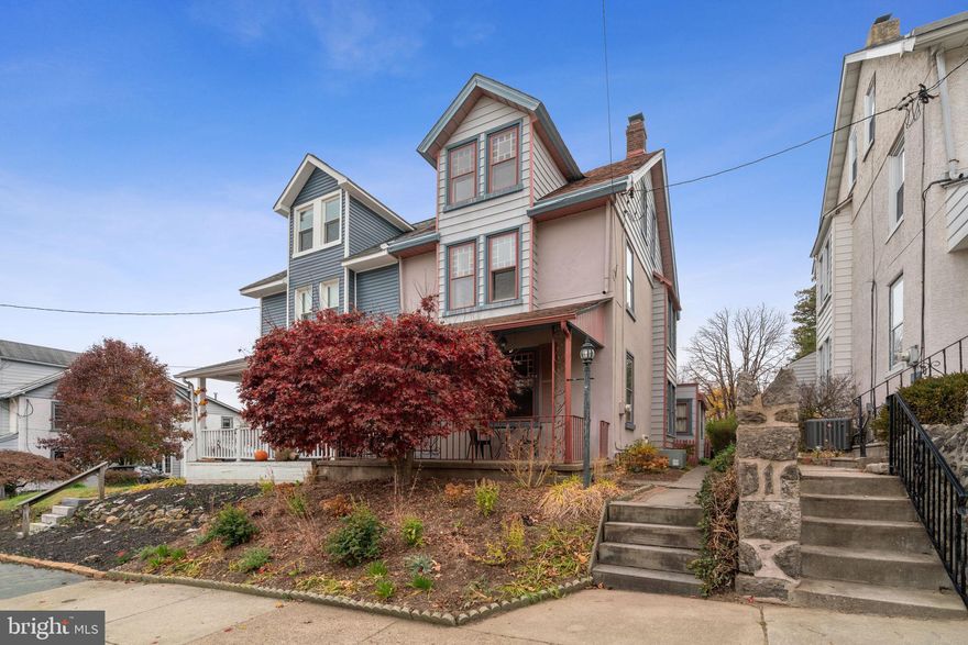 This beautiful Victorian twin is part of the Gates Street Historic District and has so much to offer! Enter from the covered front porch into an open concept floor plan with gleaming hardwood floors and plenty of original Victorian multi-colored windows found throughout the entire home. The living room and dining room open into the updated kitchen with granite countertops, stainless steel appliances, and plenty of cabinet space. A super convenient mudroom and half bathroom are off the kitchen providing access to the back patio and large private yard with a shed. Ascend to the second level to find a dedicated home office space, two spacious bedrooms with ample closet space, and a full hall bathroom with a dual vanity. Ascend one more level to the third floor where you'll find the primary bedroom, or it could be used as an additional living area, home gym, play room, or whatever fits your needs. The unfinished basement houses the laundry and is ready to be finished into even more additional living space. But that's not all! Located in the highly desired neighborhood of Roxborough, this home is in the perfect location and in the heart of it all. It's in close proximity to Gorgas Park, Ridge Ave and Main St in Manayunk. Book an appointment today!