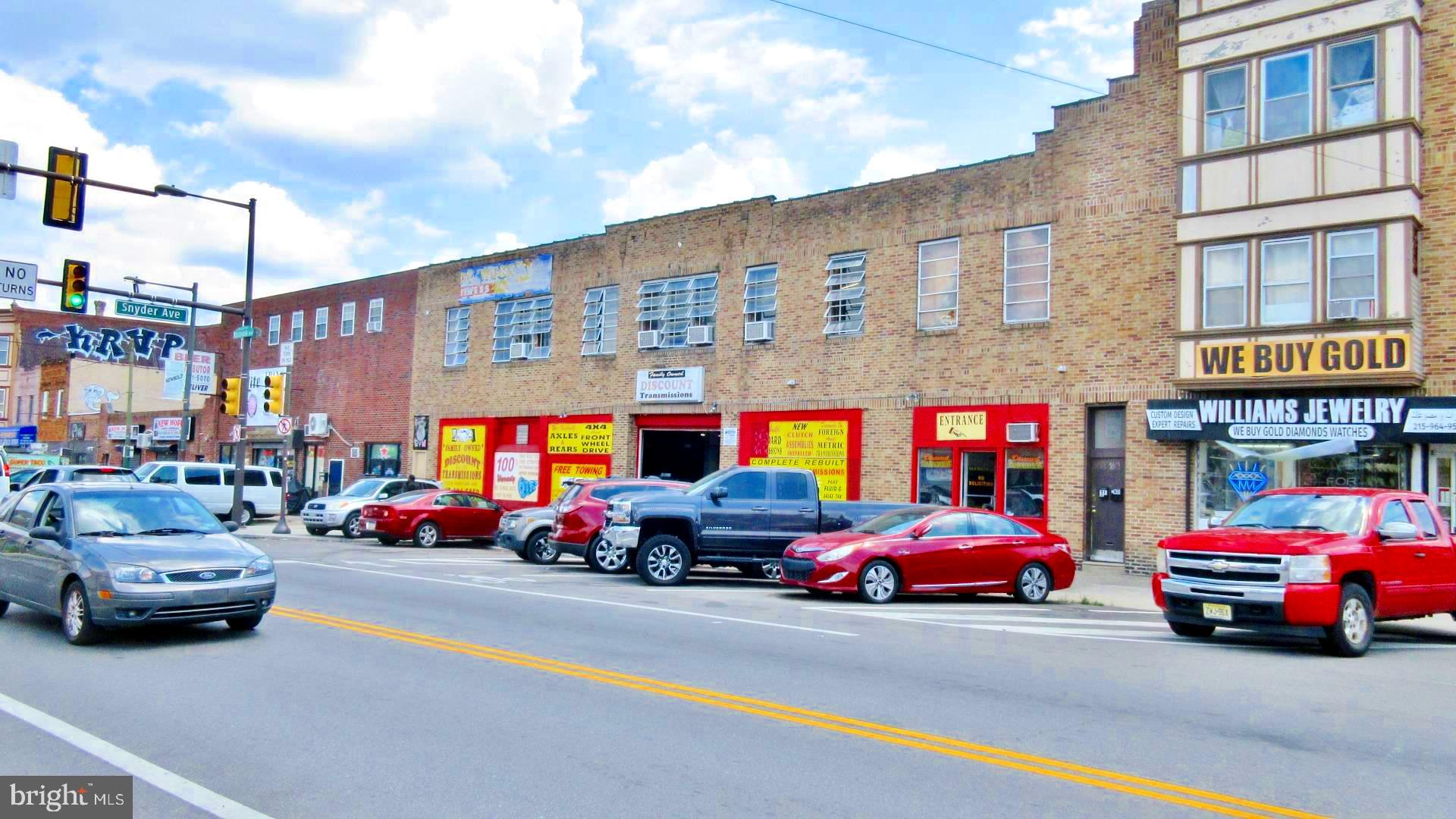 Prime commercial property for sale, featuring an auto repair and transmission shop in business since 1981. Located on a large lot with street-to-street access and two large bay doors, this facility is fully equipped and generates consistent revenue from a loyal customer base. The second floor houses a gym that has been a tenant for over 30 years, providing stable rental income at $1,800 per month. The property includes four parcels, offering significant development potential for mixed-use, retail, or additional commercial space. This sale includes real estate, equipment, and goodwill.