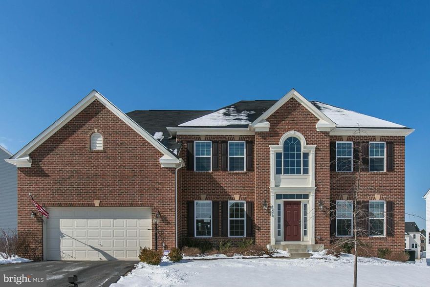 BACK ON MARKET, PRIOR OFFER'S FINANCING FELL THRU.  JUST REDUCED $10k!   Immaculate, high end finishes throughout.  All the bells & whistles, HW floors, massive kitchen, ss apps, granite, 2 islands, maple cabs, 2 fireplaces, huge great room, massive master suite, luxury bath, spacious bedrooms, finished lwr level, gorgeous trim throughout, composite new deck, shows amazing! CARTUS RELOCATION