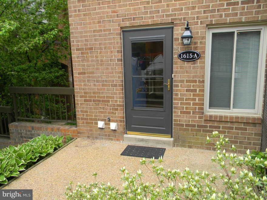 Updated  Brick End Townhouse in tranquil setting.  Freshly Painted, brand new carpet, double payne windows. Fabulous kitchen for cooks with lots of counter space & cabinets. Large living room overlooking trees & flowers outside patio for a picnic table or lounge chairs.Good size bedrooms- w/in closet MBR. Swimming Pool in the community! Pentagon City Metro  Easy living - only utility is electric!