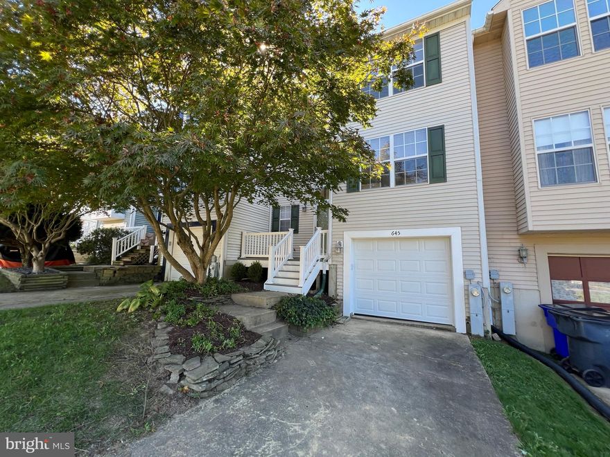 Gorgeous updated garage townhouse in Fountain Glen. This property features gleaming hardwood flooring,  new carpeting and fresh paint throughout.  Large living/dining room with wood floors and 2 sliders to huge deck which overlooks the fenced in rear yard. Kitchen features wood floors, white cabinets and counters, pantry and eat in area.  Retreat to the primary bedroom suite w/attached full bath and 2 spacious closets. There are 2 additional bedrooms on the upper level with hallway full bathroom and laundry.  Lower level features large family room with new carpet and a walkout to the fenced in yard.  Access to oversized 1 car garage from family room.   Conveniently located to schools, 95, Downtown Bel Air, shopping and restaurants.