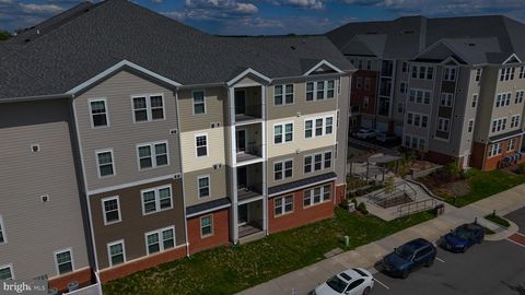 Photo of 700 Mount Airy Terrace NE #301, LEESBURG, VA 20176 (MLS # VALO2121464)