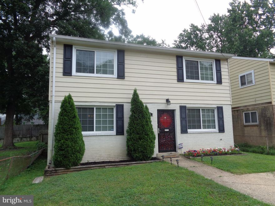 Show Stopper!!!  4 bedroom with 2 full baths.  Updated kitchen, new paint throughout this home making it move in ready.  Spacious dining room and family room for multiple times of enjoyment.  Back yard features a patio with plenty of entertainment space.  Separate laundry space with 2 backyard access space.  2 spaces off the street for your vehicles with additional off street parking.