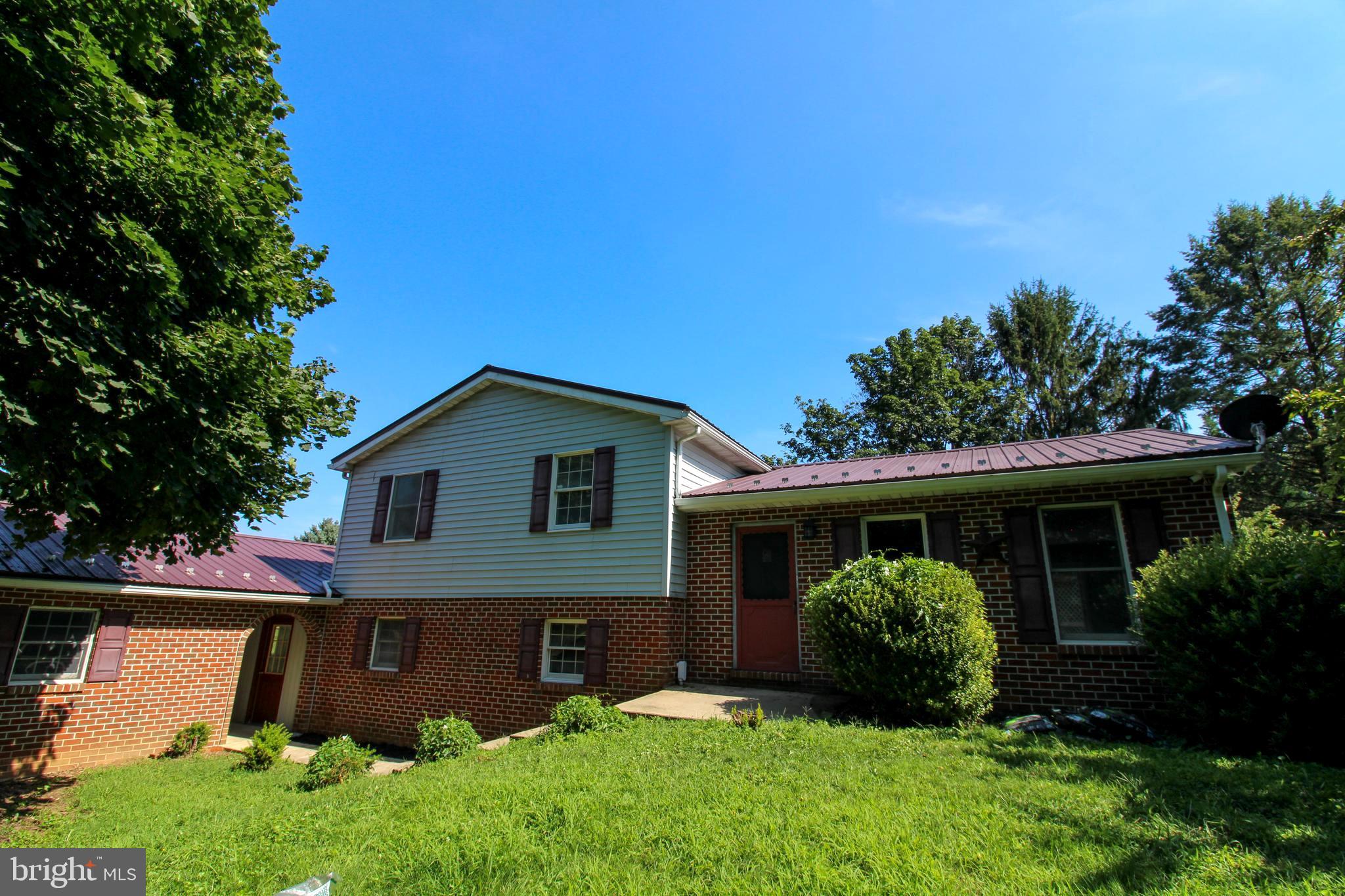 Experience quite comfort in this charming split-level. A fully open concept main level. New granite countertops, new laminate flooring, freshly painted throughout. The upper level features three comfortable bedrooms and one and a half bathrooms ,including attached laundry in the master bedroom. Two car garage and attached workshop. Situated on a generous 0.82 -acre lot. Don't miss this opportunity to call this peaceful place home!