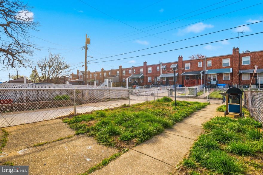 The perfect investment opportunity awaits you with this 2BR/1BA Townhome located on a quiet street in the heart of Belair-Edison.  This home features a spacious front yard, a fenced back yard with green space, and three floors of living space with a walk-out from the lower floor.  Imagine the possibilities this home offers including being close to shopping, restaurants, and commuter routes.