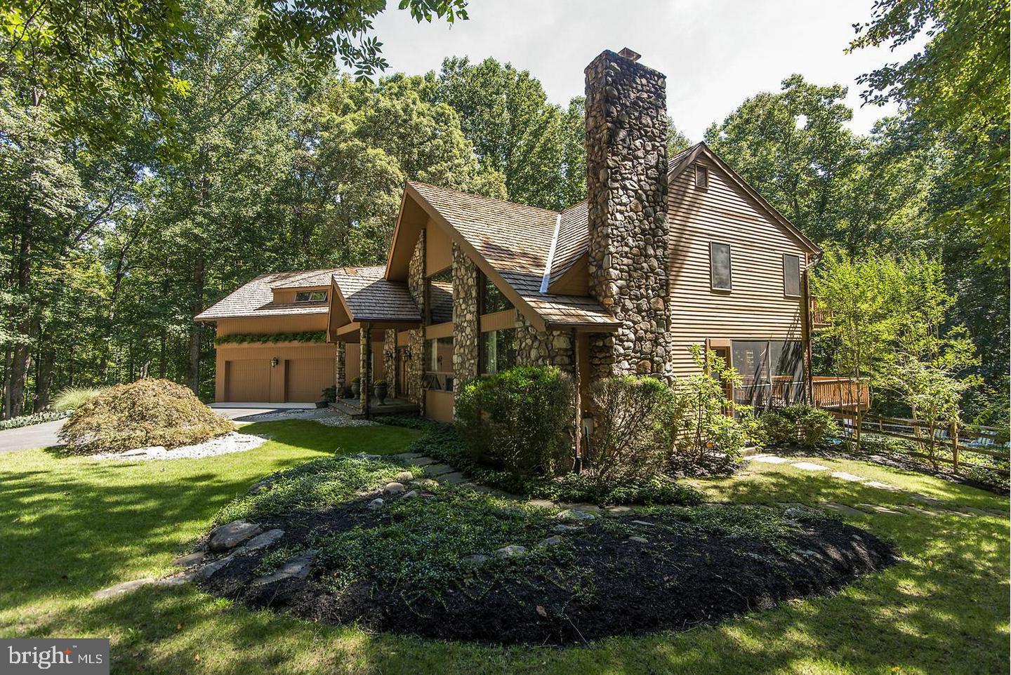 Step into your private Nature Retreat, where elegance and tranquility merge seamlessly in this custom-built estate boasting over 8,600 square feet of living space. Nestled on a 3+ acre lot that borders Gorman Park, this one-of-a-kind property offers unmatched privacy, scenic beauty, and direct access to outdoor recreation.
From the moment you enter the grand foyer, the home’s superior craftsmanship and thoughtful design are unmistakable. At the heart of the residence is a chef-inspired gourmet kitchen, complete with Wolf double ovens and cooktop, Sub-Zero paneled refrigerator, warming drawer, and abundant custom cabinetry—all highlighted by striking Caesarstone Quartz countertops.
The home offers 6 expansive bedrooms, including a serene primary suite with a two-sided fireplace, walk-in closet, and a private sitting room. A separate in-law/au pair wing provides a spacious bedroom with en-suite bath, dual walk-in closets, and its own laundry room, making it perfect for extended family or guests. Several bedrooms can easily adapt into offices, playrooms, or creative spaces, offering flexibility to suit any lifestyle.
Entertainment and relaxation come effortlessly here. Host movie nights in the state-of-the-art media room with luxury seating for eight, recharge in the home gym and spa area featuring a hot tub and dual changing rooms, or step outside to enjoy the resort-style saltwater pool and multi-level deck. The lush backyard includes a tranquil koi pond and overlooks protected parkland with hiking trails, fishing spots, and year-round outdoor activities just beyond your door.
Combining the best of both worlds, this estate provides a peaceful escape surrounded by nature while remaining conveniently close to modern amenities. Whether you’re entertaining, unwinding, or exploring the outdoors, this home delivers a lifestyle of comfort, luxury, and connection to the natural world.
Discover your park-side paradise—schedule a private tour today.