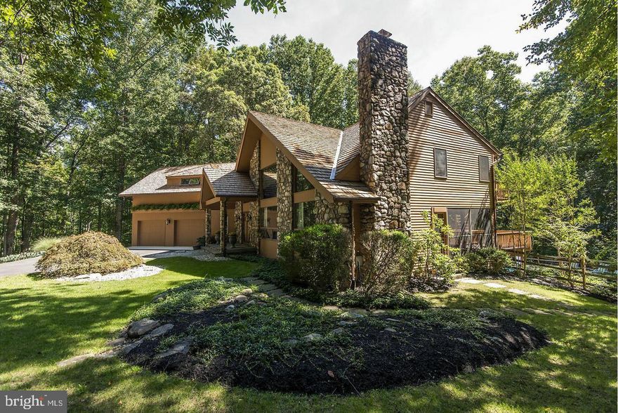 Step into your private Nature Retreat, where elegance and tranquility merge seamlessly in this custom-built estate boasting over 8,600 square feet of living space. Nestled on a 3+ acre lot that borders Gorman Park, this one-of-a-kind property offers unmatched privacy, scenic beauty, and direct access to outdoor recreation.

From the moment you enter the grand foyer, the home’s superior craftsmanship and thoughtful design are unmistakable. At the heart of the residence is a chef-inspired gourmet kitchen, complete with Wolf double ovens and cooktop, Sub-Zero paneled refrigerator, warming drawer, and abundant custom cabinetry—all highlighted by striking Caesarstone Quartz countertops.

The home offers 6 expansive bedrooms, including a serene primary suite with a two-sided fireplace, walk-in closet, and a private sitting room. A separate in-law/au pair wing provides a spacious bedroom with en-suite bath, dual walk-in closets, and its own laundry room, making it perfect for extended family or guests. Several bedrooms can easily adapt into offices, playrooms, or creative spaces, offering flexibility to suit any lifestyle.

Entertainment and relaxation come effortlessly here. Host movie nights in the state-of-the-art media room with luxury seating for eight, recharge in the home gym and spa area featuring a hot tub and dual changing rooms, or step outside to enjoy the resort-style saltwater pool and multi-level deck. The lush backyard includes a tranquil koi pond and overlooks protected parkland with hiking trails, fishing spots, and year-round outdoor activities just beyond your door.

Combining the best of both worlds, this estate provides a peaceful escape surrounded by nature while remaining conveniently close to modern amenities. Whether you’re entertaining, unwinding, or exploring the outdoors, this home delivers a lifestyle of comfort, luxury, and connection to the natural world.

Discover your park-side paradise—schedule a private tour today.