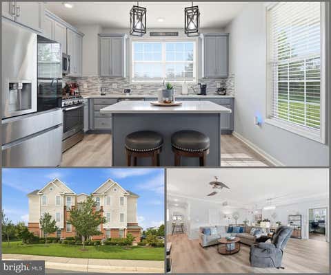 Photo of 23315 Milltown Knoll Square #102, ASHBURN, VA 20148 (MLS # VALO2134424)