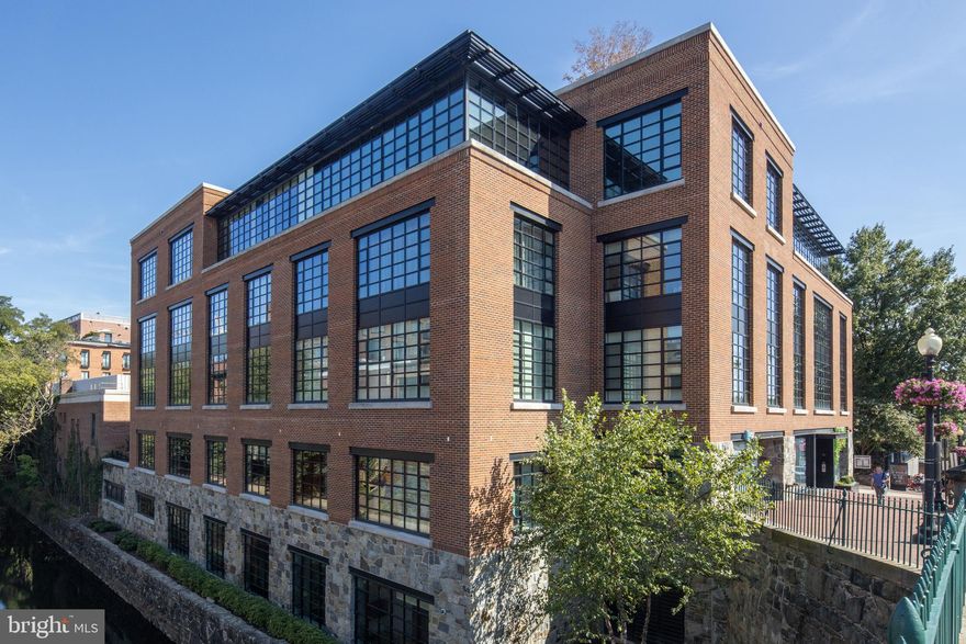 Welcome to 1055 High, Georgetown's boutique luxury building.  Unit 3-W is a 3 bedroom plus den residence that occupies half of the building's third floor.  Massive triple-paned windows on 3 sides face south, west, and north.  Some features include expansive living and entertaining space, an open Boffi kitchen with high-end appliances, den with fireplace and built-in bookcases,  and a large balcony capable of hosting a dinner party.  Other features include a full size separate laundry room with storage, 2 garage parking spaces, and 2 extra storage closets,   The building provides a front desk attendant, rooftop swimming pool, rooftop grilling area, a fitness room, and a fantastic location.