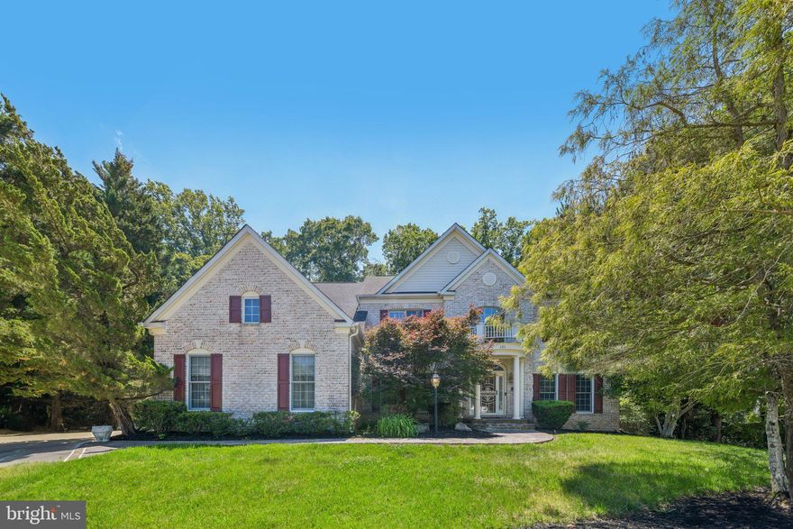 Welcome to 101 Whistling Wood Court. Poised in the gated Farmington Woods enclave, this 6,000+ sq ft custom estate has been freshly updated and meticulously maintained for its next owner. Experience architectural elegance from the moment you enter the two-story foyer, leading to a great room framed by soaring Palladian windows and tranquil forest views.

The gourmet kitchen flows seamlessly to a sprawling deck—perfect for indoor-outdoor hosting. Retreat to a massive primary sanctuary featuring a double-sided fireplace and spa-inspired bath. The fully finished walk-out lower level is a true entertainer’s hub, complete with a custom bar, and library. With recent paint and professional repairs just completed, this home offers timeless craftsmanship and rare value in a prime location minutes from DC and VA.