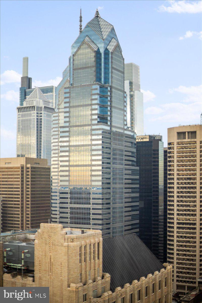 Experience the pinnacle of luxury living at Two Liberty Place with this exquisite 2-bedroom+den, 2.5-bathroom residence, offering unobstructed south and east views of the city and river from the 40th floor. Spanning 1,900 sqft, this corner unit boasts luxurious finishes and captivating features.
Upon entering, you will notice the upgraded mahogany diagonal flooring throughout out the whole-way leading into the sun-filled open living, dining, and kitchen space. The gourmet kitchen is a culinary delight, featuring a Sub-Zero refrigerator, wine cooler, Miele oven, convection microwave, and Nespresso machine. Enjoy panoramic city views from the formal dining area or the breakfast bar complemented by a full pantry closet for added storage.
The primary bedroom features expansive wall-to-wall windows, offering an uninterrupted panorama of the city skyline. You'll also find an oversized walk-in closet with custom built-ins, providing ample storage and organization. Step into the luxurious en-suite bathroom, complete with heated flooring, a relaxing soaking tub, Stand up shower, and a spacious double vanity with storage.
The second bedroom is equally inviting, boasting its own en-suite bath and a full wall of windows, allowing natural light to flood the space. Additionally, a versatile den provides the perfect space for an office or a small third bedroom, catering to your unique lifestyle needs.
Additional features include a powder room, laundry room, custom lighting, electric remote control sun shades on the windows, a deeded full storage room located just outside the front door, stronger water pressure, better cell phone reception, and not waiting for the elevator as long compared to higher floors.
The entire 37th-floor residents' amenities floor has been completely renovated, offering 2 conference rooms, a business center, fitness center, yoga studio, massage room, endless pool, men's and women's locker rooms, and a community room. Additional amenities include 24-hour concierge, chauffeur-driven car service, Valet parking and more.
Ideally located in the sought-after Rittenhouse Square, this pet-friendly residence provides easy access to fine dining, exclusive shopping, renowned cultural destinations, and exciting nightlife, all just a stone's throw away. Embrace luxury living in a prime location, with an exceptional array of services and conveniences to elevate your lifestyle.
Valet parking and indoor rented parking spaces available in the building for a fee.