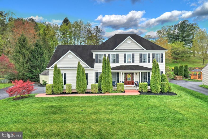 Do you want to have the perfect location, country feel with serene surroundings but easy access to all amenities and close to 83 then look no further.  Close to the rail trail and walking distance to the community park and dog park.   This lovely home tucked away in this gem of a location is well appointed 4 BR 2.5 BA colonial in located in  Colonial Meadows in Glen Rock with desirable open floor plan, offers over  3600 finished living area, with beautiful custom features such as trey ceiling, 9 ft ceilings on first floor, gleaming hardwood floors, crown moldings, large kitchen island, 42 inch cabinets,granite counter tops, farmhouse sink, stainless steel appliances, craftsman finished garage doors, family room perfectly situated off kitchen offering, cathedral ceiling, gas fireplace,  large Palladian windows offering streams of natural light with views of your professionally landscaped backyard with water feature, deck, gazebo, and terraced stone walls.  First floor accommodates your dining needs with an eat in kitchen, pantry, a separate dining room, a well needed first floor home office or retreat,  formal living room, and convenient 1st floor laundry with extra sink and cabinetry finishes off the first floor, second floor offers an owner's suite with trey ceiling, large bath with ceramic tile floors, jacuzzi tub to relax in after a long day, and separate sitting room or extra dressing room, and 3 additional ample bedrooms.   Lower level offers a family room, rough in for half bath for future expansion, and your very own man cave area with special ventilation for smoking, oversized garage and extra parking area in drive, sun-setter awning to enjoy your back deck all day long  finishes off this spectacular home.  If that wasn't enough you can walk through the home with our virtual video walk through:  https://youtu.be/5_ZAXODYAFc