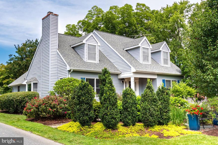 Perfectly sited on a corner lot just 2 short blocks from the center of Historic St. Michaels and the St. Michaels harbor.  Surrounded by lush landscaping, this is a private oasis in the heart of town.  Meticulously maintained and surprisingly spacious, this home offers a main level primary suite with full bath and walk-in closet.  Living room grounded by wood floors and a gas fireplace, dining room with bay window, generous kitchen has beautiful granite counters, island, tile flooring and opens to family room.  Sliders from family room open to the private deck overlooking spectacular gardens.  Main level also features an office that could be 4th bedroom.  Upper level has two large bedrooms, full bath and abundant closet space.  Gardens in front and back have irrigation system.  Detached shed and potting area.  *Short term rentals are not allowed*