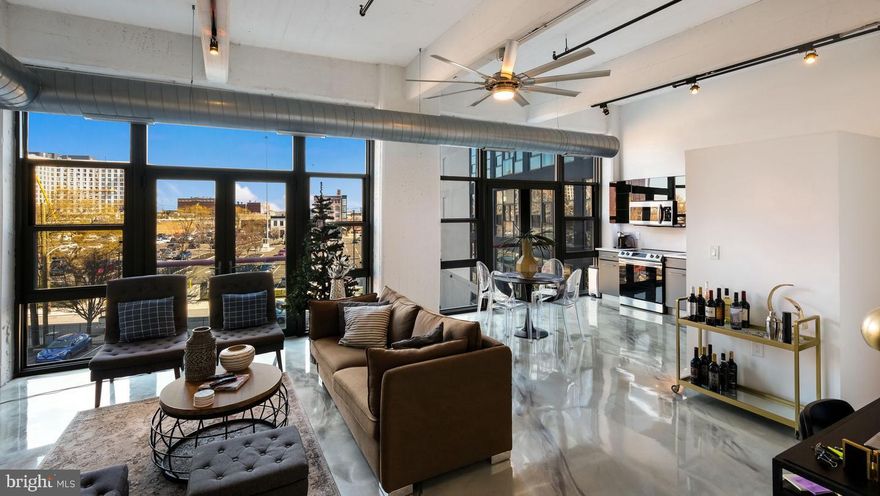 WELCOME TO THIS BEAUTIFULLY RENOVATED LOFT-STYLE CONDO - Super Contemporary and Customized Loft Style APARTMENT!! This Exquisite Unit offers  Custom Lighting throughout, Exquisite Epoxy Flooring that is durable and long lasting, Top of the Line Stainless Steel Appliances; also Includes 1 parking space in our gated lot, access to an Expansive 8000 sq ft fitness center; 24/7 front desk personnel & on-site maintenance complete this unique Living Space! This unit truly blends upscale living with Contemporary LOFT Character a rare find in one of Philadelphia's most dynamic Neighborhoods!
444 LOFTS is a true warehouse conversion featuring Soaring  Concrete beamed ceilings and Oversized double Pane Floor to Ceiling Thermal Windows. The Custom Kitchen features quartz countertops, Glass Cabinetry & Stainless Steel Appliances. Stacked washer/dryer, Generous closet space. This unit features Large Floor to Ceiling Windows with 2 Juliette Balconies, Bright, Open, Spacious Living  & A Substantial Master Bedroom with a Grand Walk-in closet & Dressing room area, Custom Luxurious Bathroom with a Beautiful Large WALK-IN Tiled Shower w/ Glass Door Enclosure complete this One-bedroom Condo. BRAND NEW HVAC SYSTEM installed in 2025, Enjoy year round comfort and energy efficiency with a newly installed heating and cooling system.
The Lobby @ 444 LOFTS is newly renovated, a stunning and captivating renovation that was recently completed....SALE includes 1 Parking Space in our lot and a LARGE Storage Bin in the basement are included with this Purchase!
EXCEPTIONAL CONDO LIVING @ 444 LOFTS IN THE VIBRANT OLD CITY/NORTHERN LIBERTIES NEIGHBORHOOD...HOME TO "BE WELL FED" HEALTHY MEAL PREPARED FOOD & "SMALL WORLD SEAFOOD" BEST PINK SALMON IN THE CITY!! Don't miss this Opportunity to make this stunning Condo your new home!