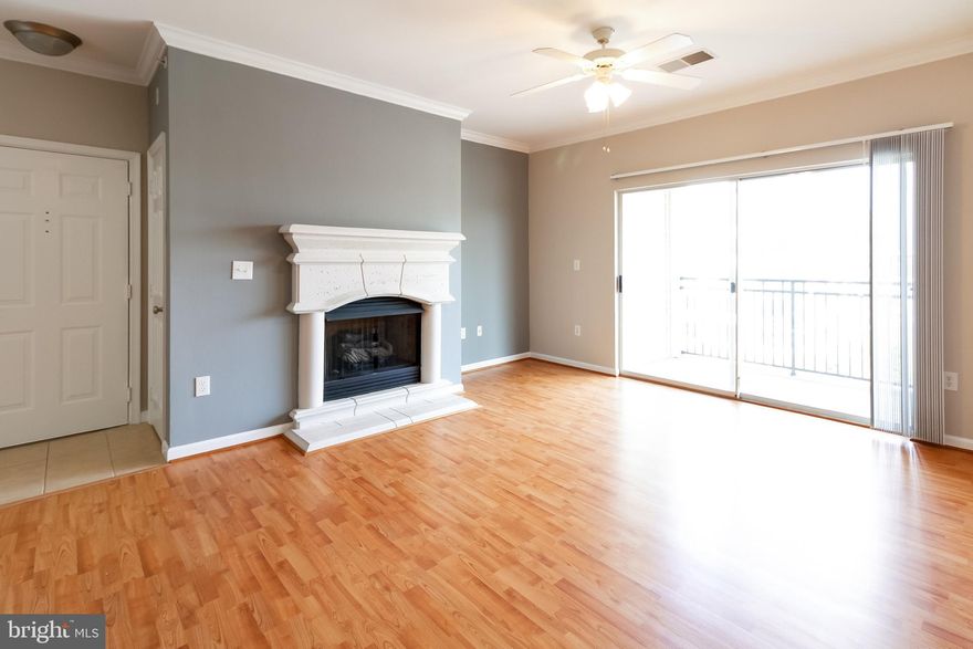 Relax and Enjoy your night view on cozy top floor balcony with a glass of wine!  Scenic View at Northeast Summit of Bryson Condo, one of the best premium unit at end of corridor.  Overlooking at Reston Town Center Direction,  Can even view fireworks on special days! Rarely available model and layout with 2 beds and 1 bath!  Fresh painted ,  Wood floor,  Granite counter top, Stainless Steel Appliances.   2 years new extra layer of sound proof windows  make the unit fairly quiet on the top floor.  New community across the street from balcony will have great view once landscaping completed within days. Washer new 2020.  Two Parking spots 330B and 406B.