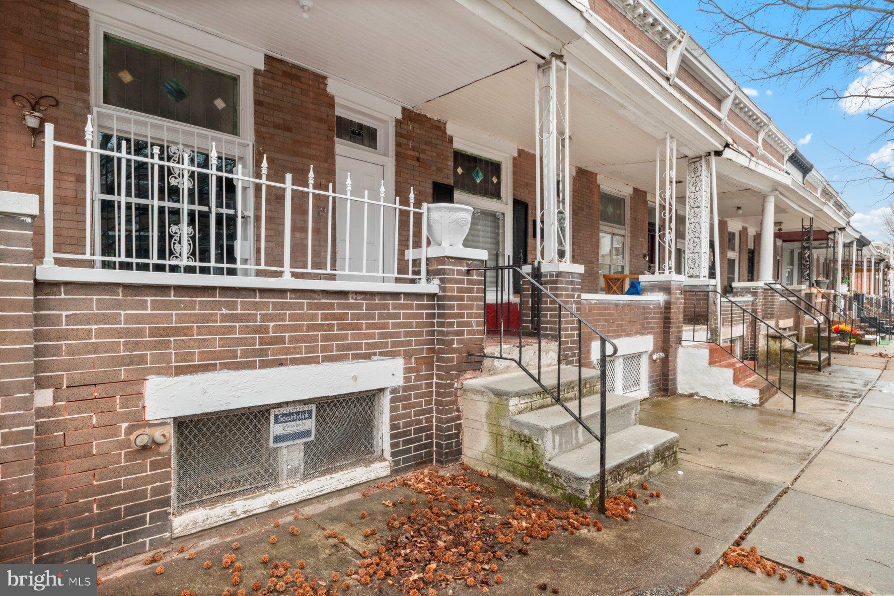 Newly remodeled 3BR/1BA expanded brick townhome located in the Clifton Park neighborhood of Baltimore City! Make your way to the covered front porch and open the door into your forever home boasting a bright and airy main floor featuring a soft color palette and stunning luxury flooring. The main floor features an open floor plan with a spacious living room boasting a knotty pine wood feature wall, a cozy dining area and a newly remodeled kitchen. The kitchen features plenty of cabinets, quartz countertops with a complementing backsplash. Just beyond the kitchen is a spacious room ideal as a home office, with a large glass window and access to the fenced yard. The luxury flooring continues onto the second floor into the primary and two sizable bedrooms, and a newly remodeled full bath with tile from ceiling to tub. The lower level offers additional living space featuring a spacious family room, storage, laundry and a walk-out to the yard. The yard offers plenty of possibilities for entertaining family and friends. This home is move-in ready and is located in close proximity to shopping, restaurants, and commuter routes.