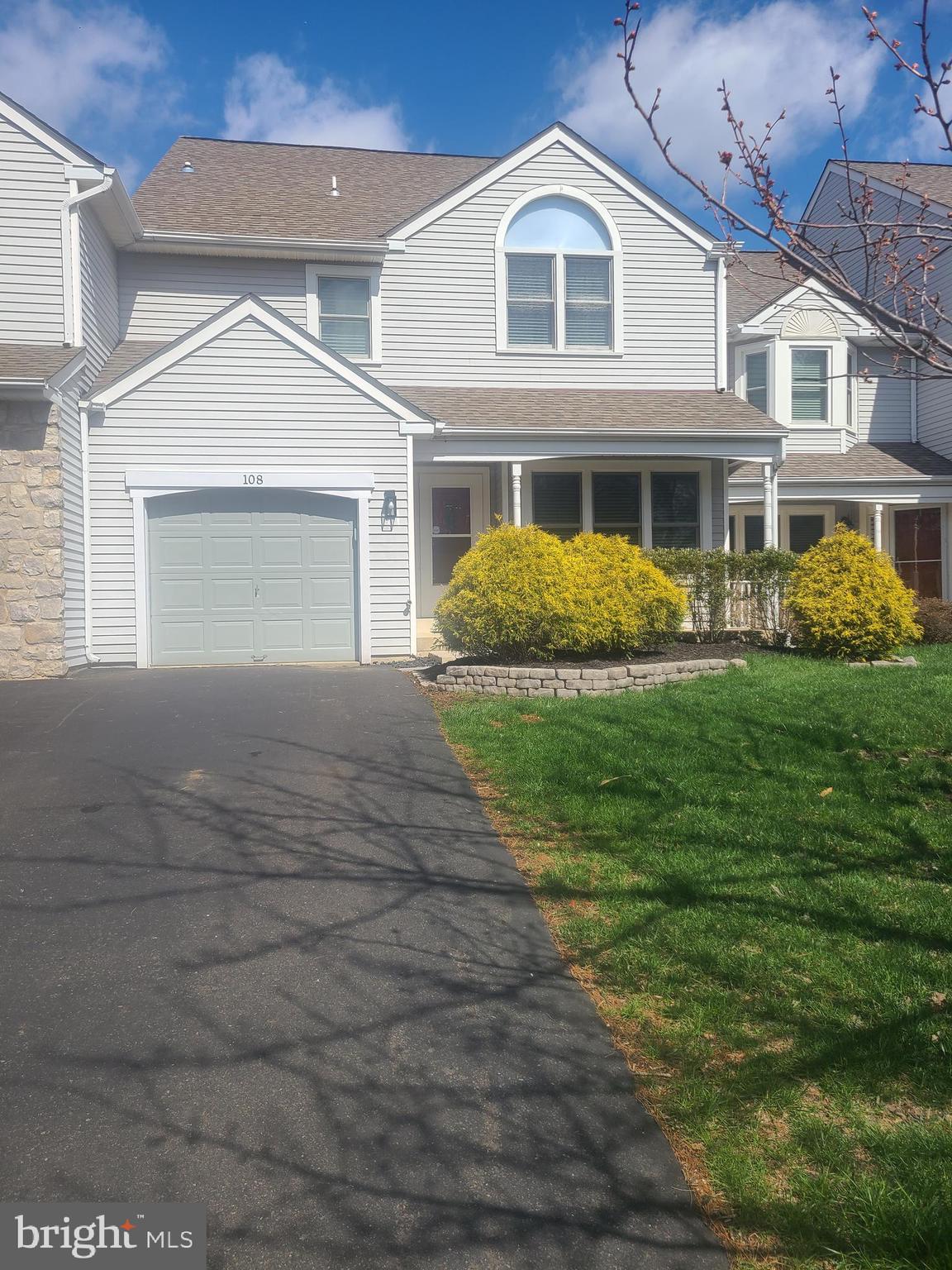 Welcome to this beautifully updated and freshly painted 3 bedroom/ 2.5 bath townhouse with a full basement and attached garage located at 108 Filly Drive, North Wales in the desirable Montgomery Greene Community, Montgomery Township, North Penn School District. This is a well maintained property offering comfortable and a convenient living experience. Located in a quiet neighborhood community with street lights, sidewalks and many parks close by. The front porch leads to the doorway entry. Open living room/ dining room. Close by is the powder room and indoor garage access. Walking to the back of the home is a brand new kitchen with the breakfast room with a sky light located overhead bringing in the natural light. Enjoy entertaining in the renovated kitchen with new amenities: new beautiful white spacious cabinets, elegant quartz counters, stainless steel appliances, a garbage disposal, gas cooking, tiled back splash with under the counter and overhead ceiling lighting in addition to beautiful pendant fixtures over the kitchen island. The deck is located off of the kitchen for easy grilling and entertaining. There are hard wood floors throughout the first floor. 3 bedrooms newly carpeted are upstairs. Plenty of storage throughout the home with the built-in closet shelving throughout. The 2nd floor laundry area is convenient with full size washer and dryer. French doors lead into the main bedroom which has a newly renovated bathroom with a large walk-in shower, linen closet and double vanity sinks with tiled flooring. There are two other nice size bedrooms with spacious closets. The newly renovated main hall bath has a tiled tub/shower. The full size basement adds additional storage or space to play. Brand new HVAC unit. Great location. Close to everything. Route 202 Bypass, Rt 309, PA Turnpike, and train. Many parks are within the area. Montgomery Township Recreation Center along with it's playground is walking distance away. Nearby shopping and restaurants.