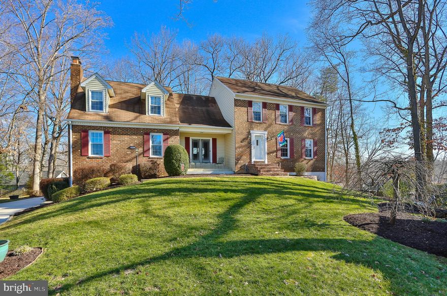 Elegance, spaciousness, uniqueness and homeliness are all combined in this impressive home in the sought after neighborhood of Montclair!
Meticulously maintained, updated and loved, it is ready for its new owners. 
Set back from the street offering privacy, this lovely home is surrounded by beautiful landscaping on all sides. Stamped concrete patio, treed backyard with a picturesque fish pond and countless gorgeous bushes and flower beds make this the perfect retreat. 
To the right of the entrance, step down to the front room, currently used as a large dining room, perfect for festive gatherings. Follow through to a cozy living room, then to the gourmet eat-in kitchen with granite counters, built in drinks cabinet, recessed lighting, and patio doors leading to the deck and back yard where you can enjoy panoramic views.
From the kitchen, a bright and open breakfast area with glass patio doors leads to the grand family room. The brick, propane fireplace catches the eye immediately, becoming the focal point of this bright room surrounded with windows on three sides.
The main level is completed with a modern, updated powder room, laundry room, and gleaming hardwood floors. 
The primary bedroom suite is a unique, calming retreat with its vaulted ceiling, fireplace, dressing area, and a wonderfully designed bathroom with modern tiles, vanity, and walk in shower. 
The upper level features three more bedrooms and an updated spacious bathroom with dual vanities. 
The basement offers a great, versatile space for entertainment, home office or relaxation. It feels very spacious with the over 8’ tall ceilings, new carpet, and windows on two sides, a bonus room and a full bathroom with heater exhaust fan. Several closets offer ample storage room. The garage is accessible from the basement. 
Custom paint throughout. New water heater in 2022. New driveway, stamped concrete patio and deck in 2021. Primary bathroom remodeled in 2021. 
Montclair offers an abundance of amenities with a 108 acre lake, beaches, sports fields, tot lots, dog park, library, shopping center, restaurants, walk ways, and community events throughout the year. Montclair is the community where houses are homes and neighbors are friends! Convenient for commuting to Quantico MCB, Fort Belvoir, The Pentagon and Washington D.C. Omniride bus stops are all through the community, 10 mins to I95 and commuter parking, 20 mins to VRE.