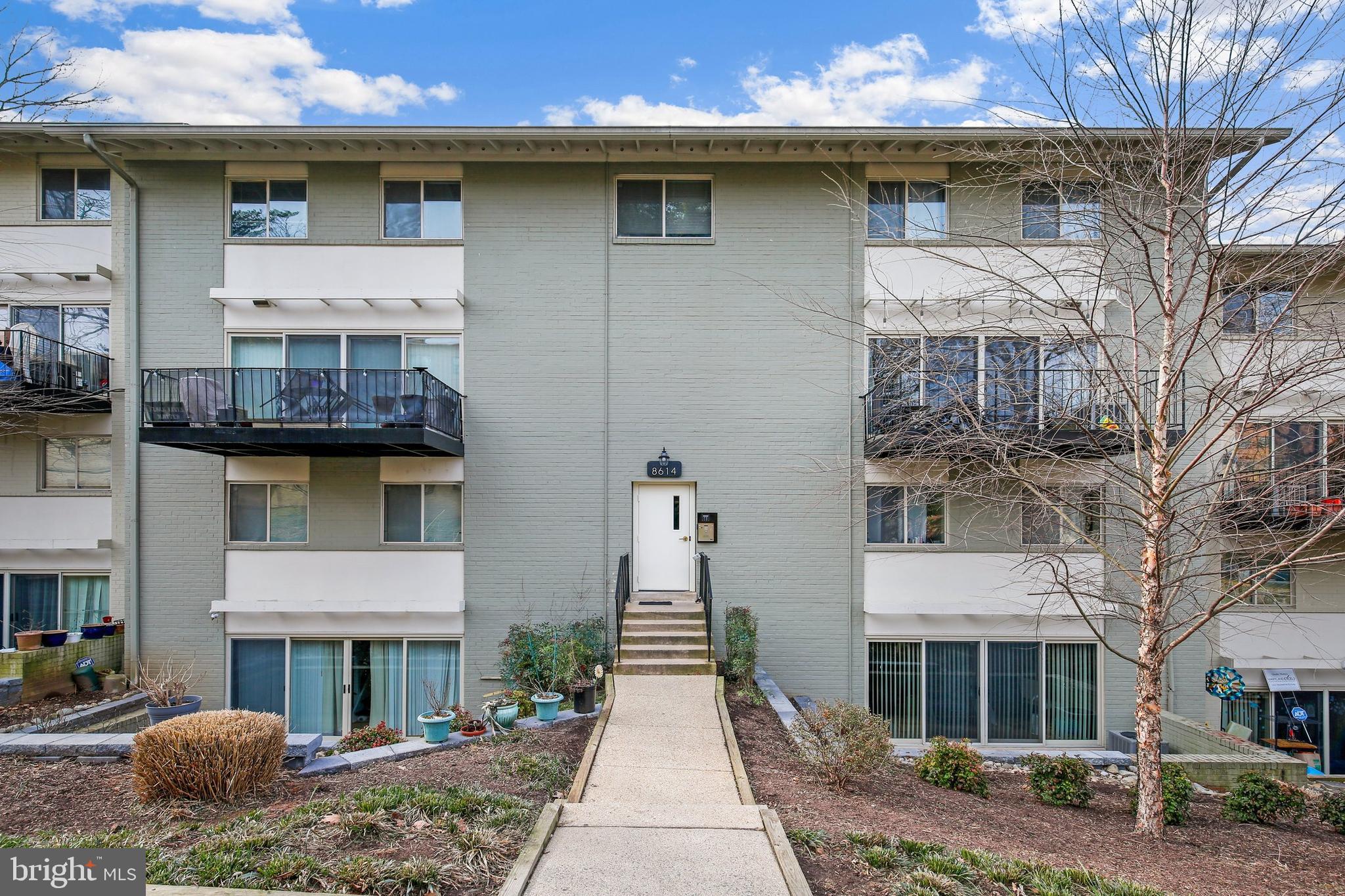 8614 Manchester Rd #5 is a charming and spacious 2 level condo located in the heart of Silver Spring, Maryland. This cozy condo features an open and airy living room with large windows that let in an abundance of natural light, creating a warm and inviting atmosphere. The well-appointed kitchen boasts modern appliances, ample counter space, and plenty of cabinets, providing an ideal space for cooking and entertaining. Both bedrooms are generously sized and offer ample closet space, providing a comfortable and relaxing space to unwind after a long day. The condo also features a tastefully designed bathroom with a shower/tub combination and a large vanity, providing a perfect space to refresh and rejuvenate. Other features of the condo include central air conditioning, in-unit laundry, and dedicated parking. Located just minutes from downtown Silver Spring, this condo offers easy access to shopping, dining, and entertainment. The community is well-maintained, quiet, and offers a serene park-like setting. With its excellent location, modern amenities, and comfortable living spaces, this is the perfect place to call home.