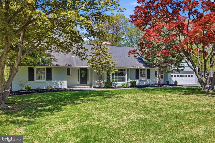 Set on nearly two private acres within the sought after Downingtown Area School District, this move in ready home offers the space and flexibility that are increasingly hard to find in Downingtown. Surrounded by mature trees and a peaceful, serene neighborhood, the property provides a rare opportunity to enjoy both privacy and convenience.
The home is designed for easy single level living, featuring a spacious living room with a wood burning fireplace, a formal dining area, and a bright eat in kitchen. The kitchen features a central island, ample storage, and sliding doors that open directly to the expansive backyard. The rear deck overlooks the level lot and wooded surroundings, creating an ideal setting for everyday living and entertaining.
Three comfortable bedrooms are located on the main level, including a primary suite with three closets and a private full bath, along with a well appointed hall bathroom. The lower level adds even more versatility with a partially finished space that is perfect for a media room, playroom, or additional living area, plus a separate 4th bedroom or office for added privacy. A large unfinished section presents incredible potential, complete with walk out access, a half bath, and a dedicated laundry area.
A breezeway just off the kitchen offers a space for grilling, a  mudroom, or cozy sitting space. The oversized two car garage provides ample room for vehicles, hobbies, and additional storage.
Lovingly maintained over the years, with a new septic tank installed in March 2026 and a successful water test already completed, this home offers both peace of mind and lasting value in a truly desirable setting.