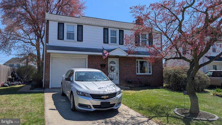 SEE OFFER DEADLINE IN AGENT REMARKS! Welcome to this charming Colonial-style home, that has been well maintained and updated. Built in 1945, this inviting residence boasts 1,514 square feet of well-designed living space, featuring three spacious bedrooms and two full bathrooms. The warm ambiance is enhanced by a variety of flooring options, including hardwood and ceramic tile, creating a cozy yet stylish atmosphere throughout. The well-maintained brick and aluminum siding provides durability and timeless appeal, while the neatly landscaped lot and fenced rear yard, offer a perfect space for outdoor activities or gardening. Parking is a breeze with an attached garage and additional driveway space, ensuring convenience for you and your guests. The unfinished basement presents an excellent opportunity for a workshop, extra storage, and includes the washer & dryer. Located just under 10 miles from the airport and within a mile of public transportation, this home combines accessibility with a peaceful residential setting. Embrace the warmth and character of this delightful property, where comfort meets convenience, making it the perfect place to call home. Don’t miss your chance to make this inviting Colonial yours! Center City Philadelphia, the Philadelphia International Airport, and the South Philadelphia Sports Complex are just minutes away!