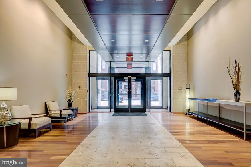 Now is your opportunity to rent this luxurious, grand condominium in coveted 1209 N Charles.  Located in the heart of Midtown/Mount Vernon, mere steps to art houses, theaters, the Baltimore Symphony Orchestra, Univ of Baltimore and restaurants offering an array of international cuisine.  2 blocks to Penn Station for MARC/Amtrak travel to DC, Boston and points in between.  Perfect for relaxing and entertaining, this super-sized 1br of almost 1,200 sq ft offers plenty of space and features including tall 10' ceilings, large bay & floor to ceiling windows allowing lots of light.  Gleaming wood flooring, stainless steel kitchen appliances with gas cooking, breakfast bar, dual vanity bath suite and much more.  Large storage locker (steps from the condo) and dedicated garage parking space included!  Bldg offers residents a private, landscaped interior courtyard, an on site gym, and more.  Starbucks, restaurants, retail on ground floor!  Rent includes storage unit and parking.