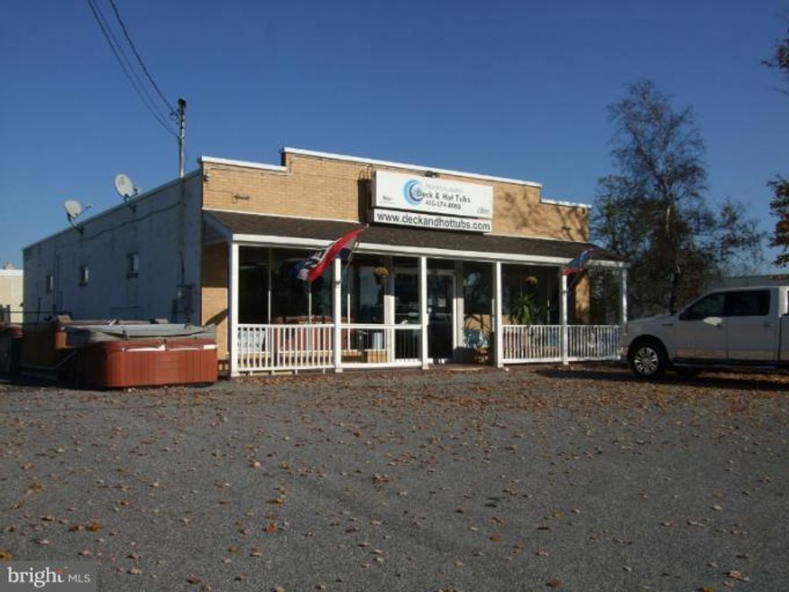 Once a Hardware store and now a Spa showroom. This fantastic property located on RTE 140 has great public exposure. The property consists of a 1 story store and showroom as well as a 2 story warehouse with power for storage or a workshop. Buildings sit on .81 acres of property with plenty of room for additional parking.