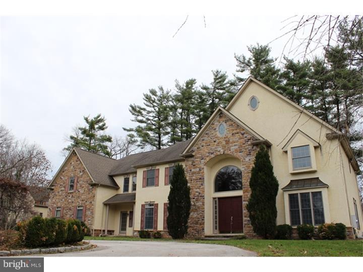 Over 5500 square feet of luxury living on a wooded 1.5 acre lot in Lower Gwynedd.  The grand entrance leads you to an open foyer with an amazing wooden spiral staircase.  Hardwood floors extend through a majority of the 1st floor, including the 2-story great room with marble fireplace.  The cherry kitchen offers endless cabinets and counter space and offers a gas cook-top range perfectly situated on the kitchen island.  The lower level has also been tastefully finished offering a main entertaining area, a separate recreational room closed off by french doors and a separate storage area.  The 2nd floor consist of 3 handsomely sized bedrooms and amazing master suite.  The master features a large, luxurious bathroom with walk-in shower and soaking tub.  In addition, there is a gas fireplace and separate room that would be ideal for a dressing room, sitting room or office.  2-zone propane HVAC and A/C.  Large driveway with room for 5+ cars as well as a 3-car attached garage.