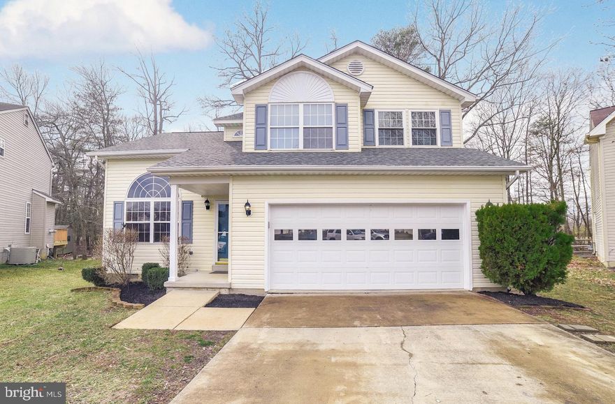 Welcome Home! Fall in love the moment you walk in the door to this beautifully maintained lake front home! Open floor plan concept features living room w/ hardwood floors and vaulted ceilings (or could be used as formal dining room or office). Kitchen w/ granite counter tops and gas stove opens to family room w/ fireplace, vaulted ceilings and slider off of kitchen leading to private backyard and lake... the perfect space for entertaining friends & family! Upstairs boasts 3 spacious bedrooms & 2 baths... master suite w/ walk in closet, and master bath w/ double sinks, soaking tub and separate shower.  2 car garage! Located at end of cul - de - sac! Easy commute to DC & NOVA. Community amenities include club house and pool!