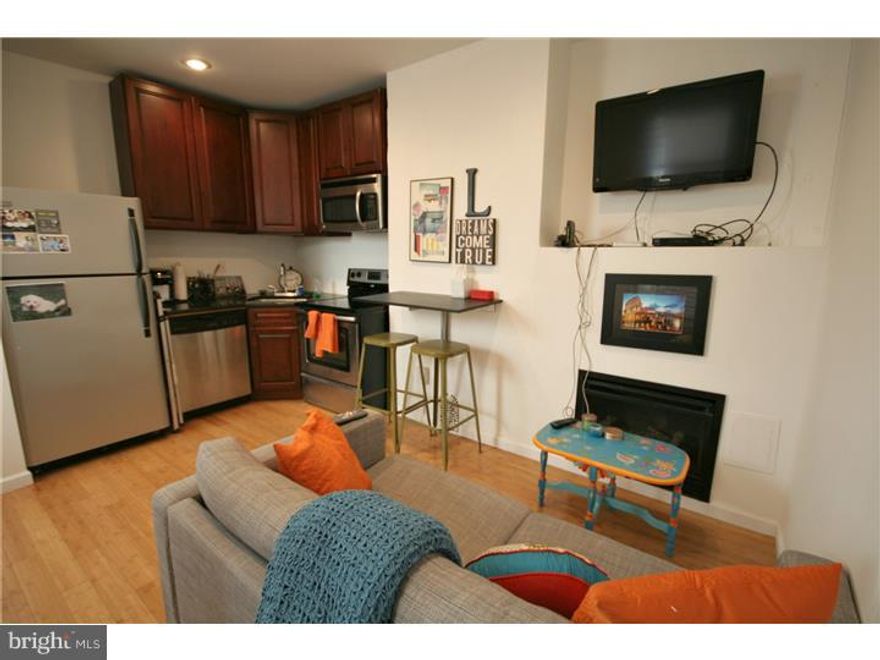 Available early June:  This is a newly updated 1 bedroom apartment on the 1st floor of a multi-unit building in the heart of the Graduate Hospital neighborhood a half block south of South Street, within walking distance to awesome new restaurants, bars & shopping.   There are hardwood floors throughout except for the bathroom, which is tiled. A convenient location + modern touches like stainless steel appliances, recessed lighting, granite countertops and a working gas fireplace in the living room make this unit a great find. Gas for the fireplace is included with the rent, tenants are responsible for $25/month flat water fee + the monthly electricity which must be placed in their names.   There is coin-op common laundry facilities in the basement of the building (convenient for this particular unit, since the stairway is right outside your unit door) and there are also storage bins in the basement for your use.   First month, last month, one month security deposit are due at lease signing. $45 application fee per applicant.